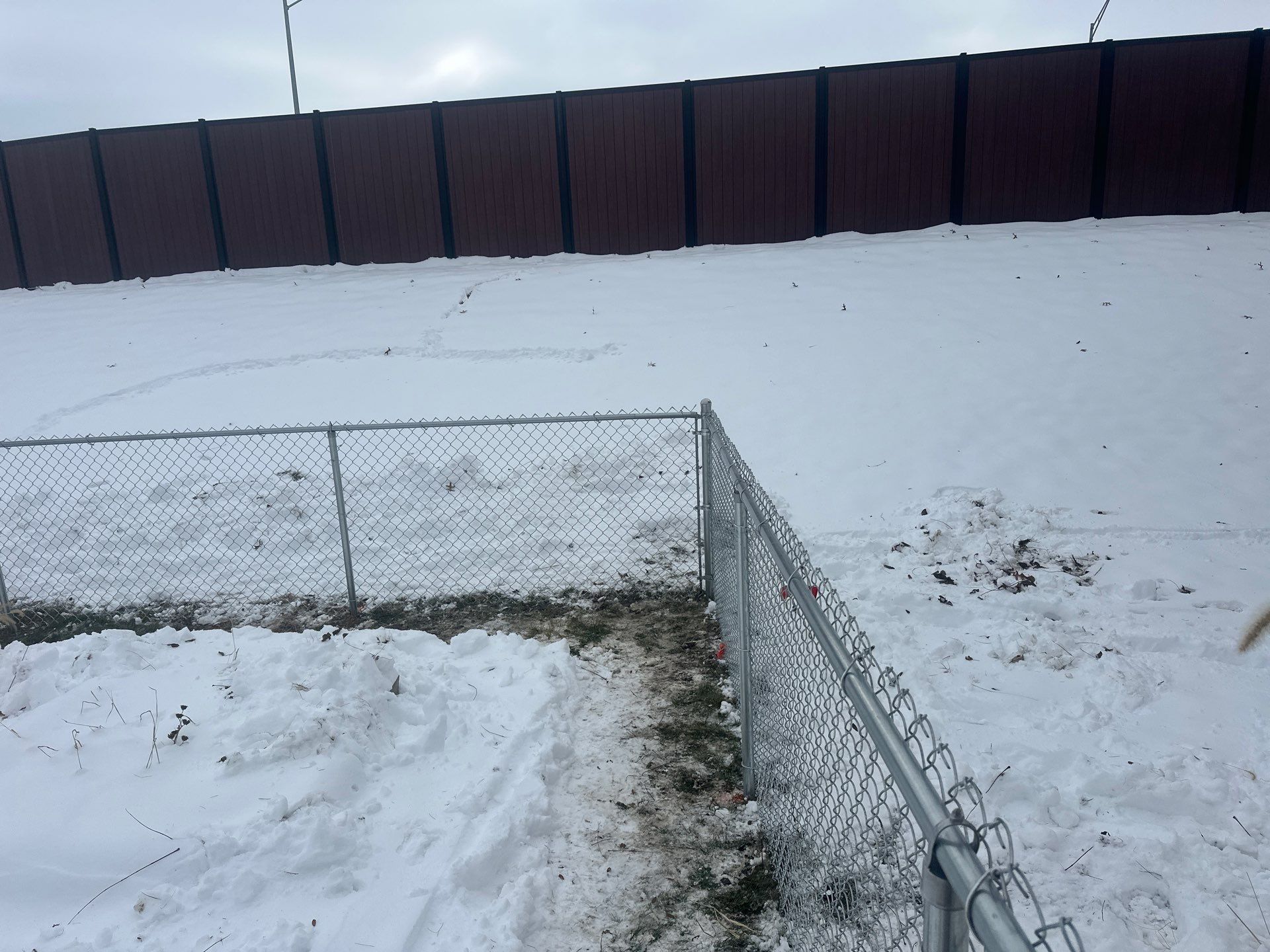 Galvanized Chain Link Fence Installation in Cedar Falls IA by Perfect Picket Fence and Stain