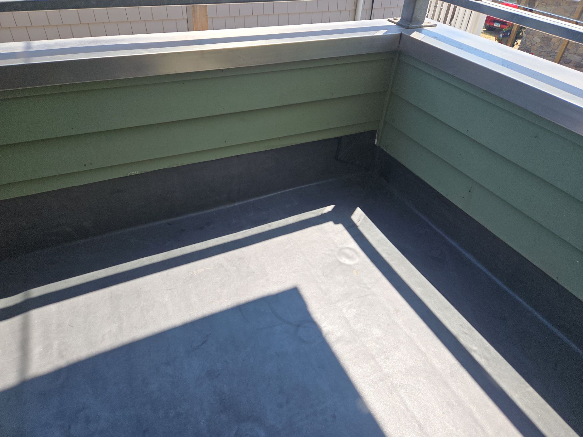 Deck Installation using Tanzite Stone Decking by A Plus Exterior