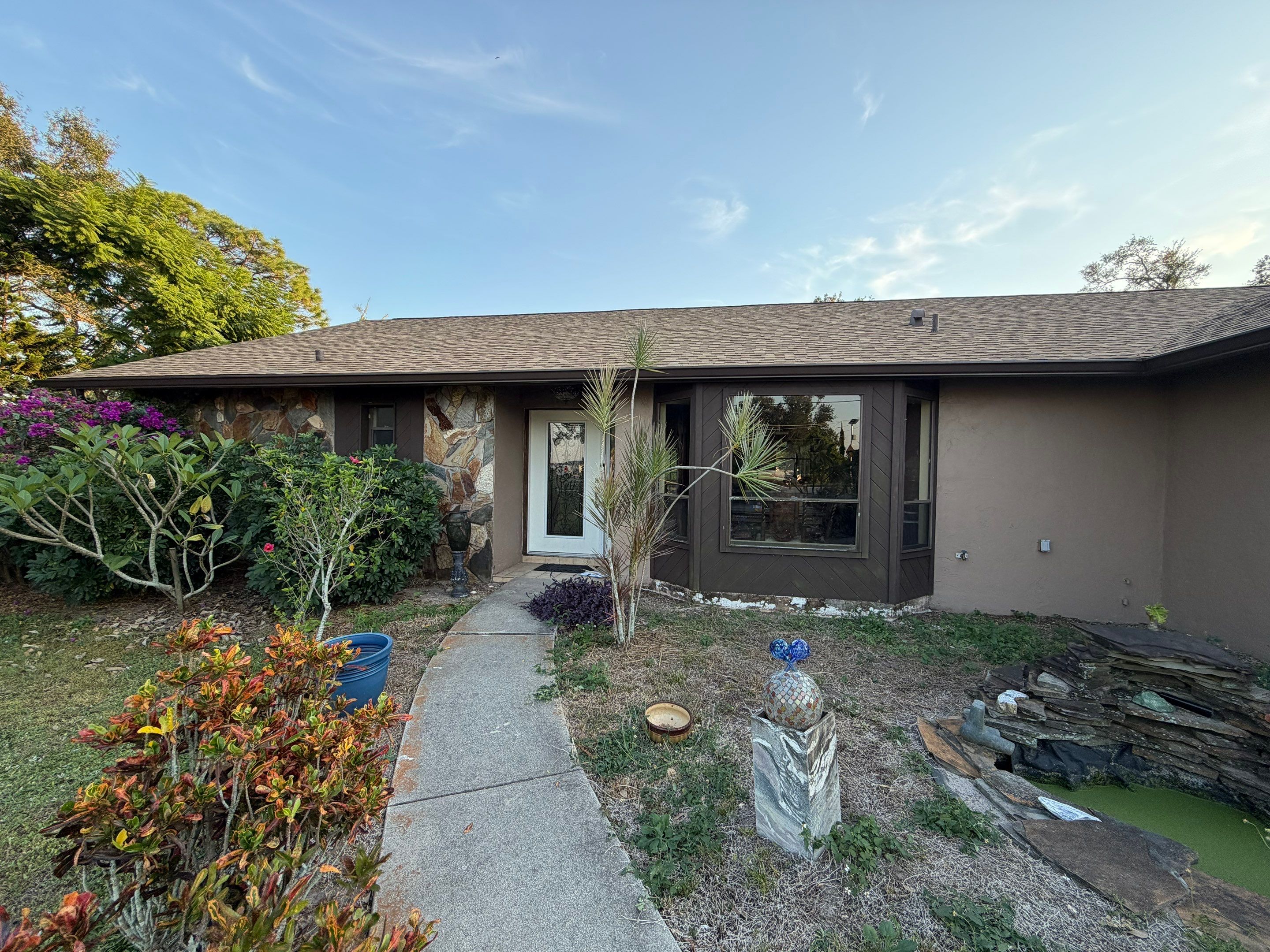 Brown Seamless Gutters for Beach Cottages in Sarasota FL by Gutter Professors