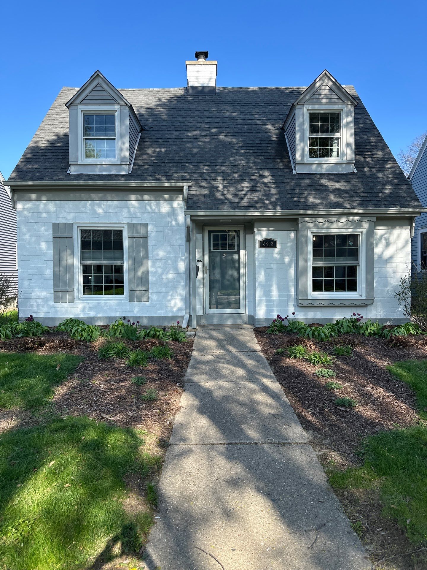 Milwaukee Cape Cod Exterior Renovation and Siding Replacement by OCS Contracting Services
