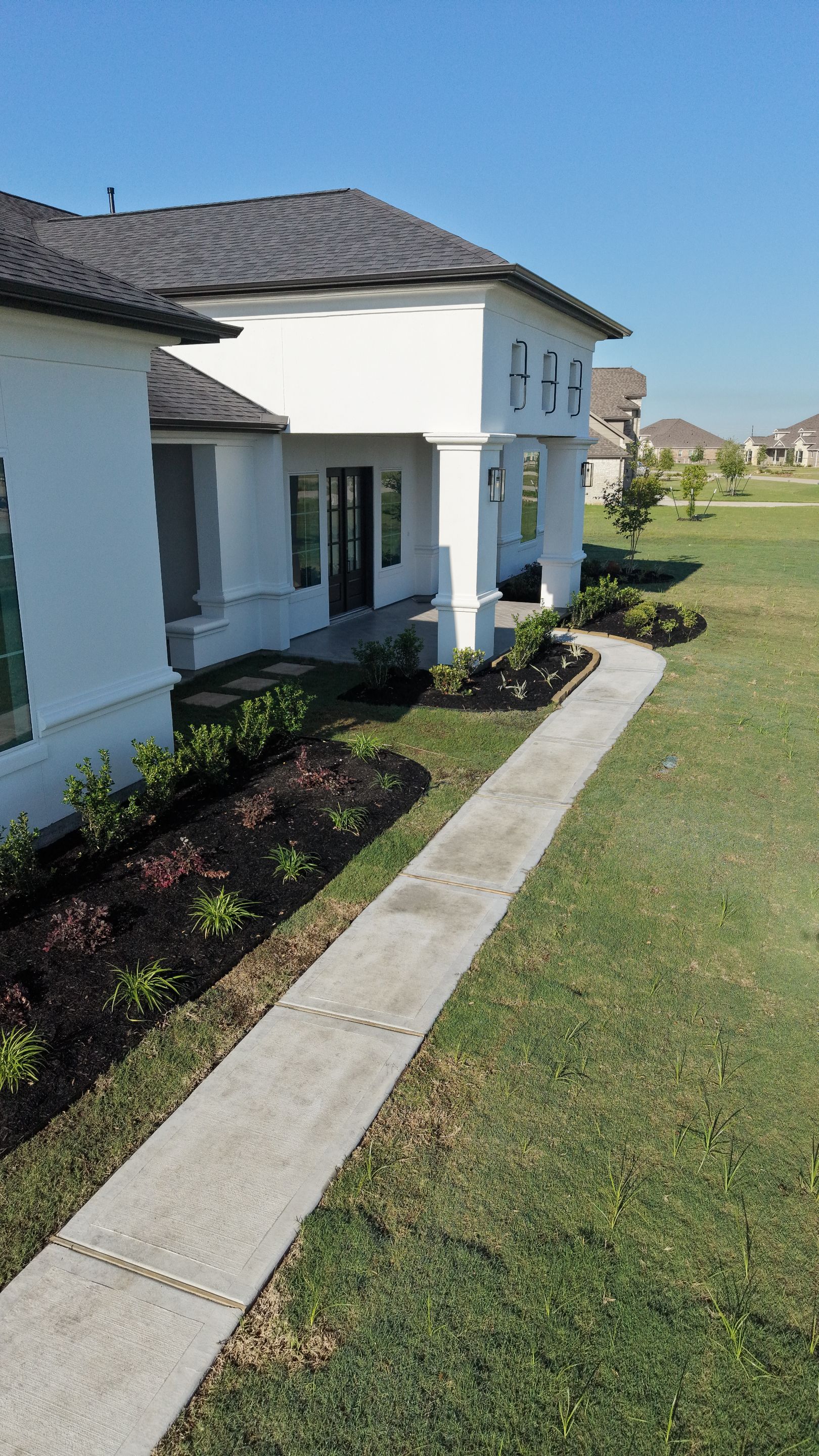 Custom Stucco Masterpiece with Precision Foam Detailing – Waller, TX by Apex Conventional Stucco Llc