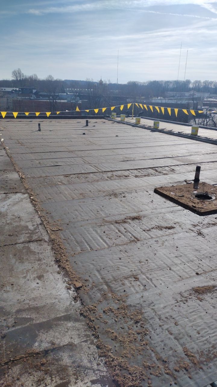Commercial flat roof parma by Absolute Roofing and Construction