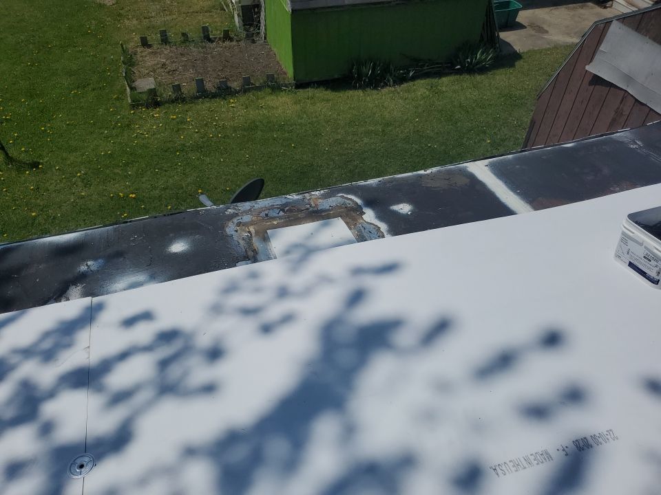 Residential Roofing Installation using 60 mil rubber roof  by Nitro Roofing and Construction
