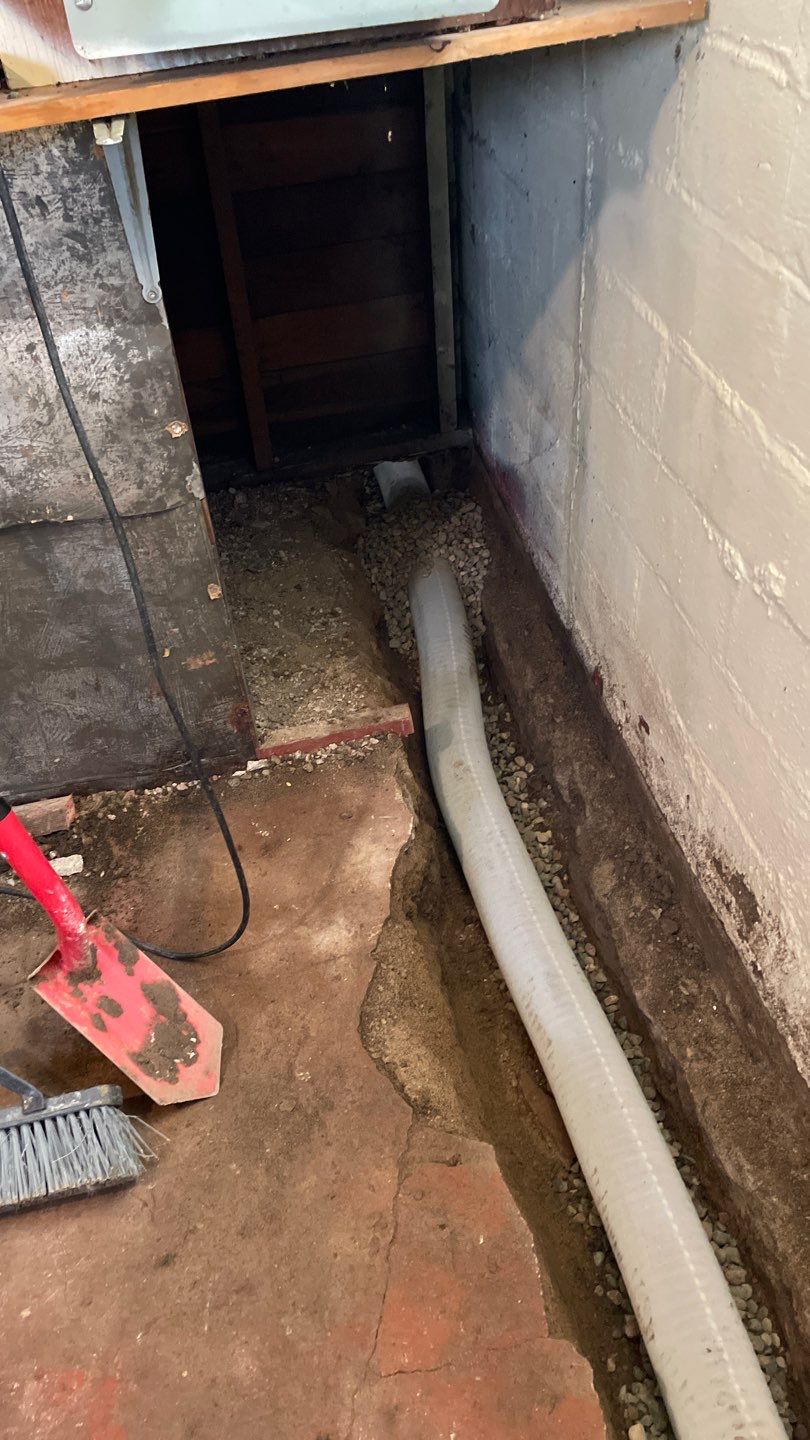 Interior Drain Tile & Sump Pump System in North Minneapolis by Waterproofing Northeast