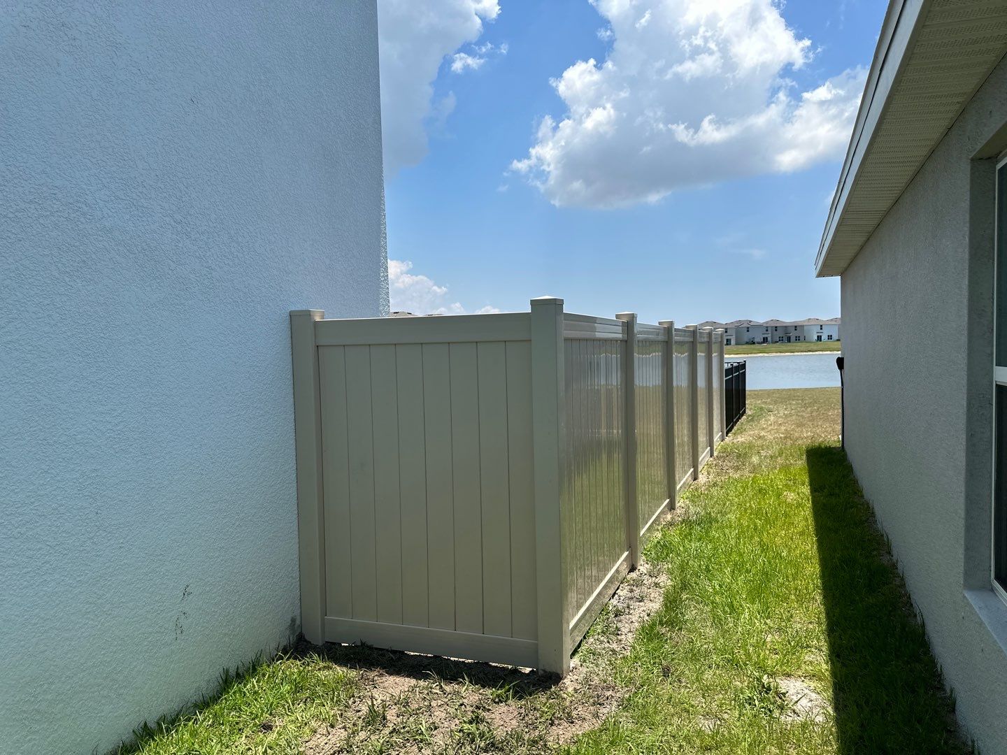 Aluminum Fence Installation using Black 3 Rail Aluminum Fence and Tan Vinyl Privacy Fence by Asap fence and gates, LLC
