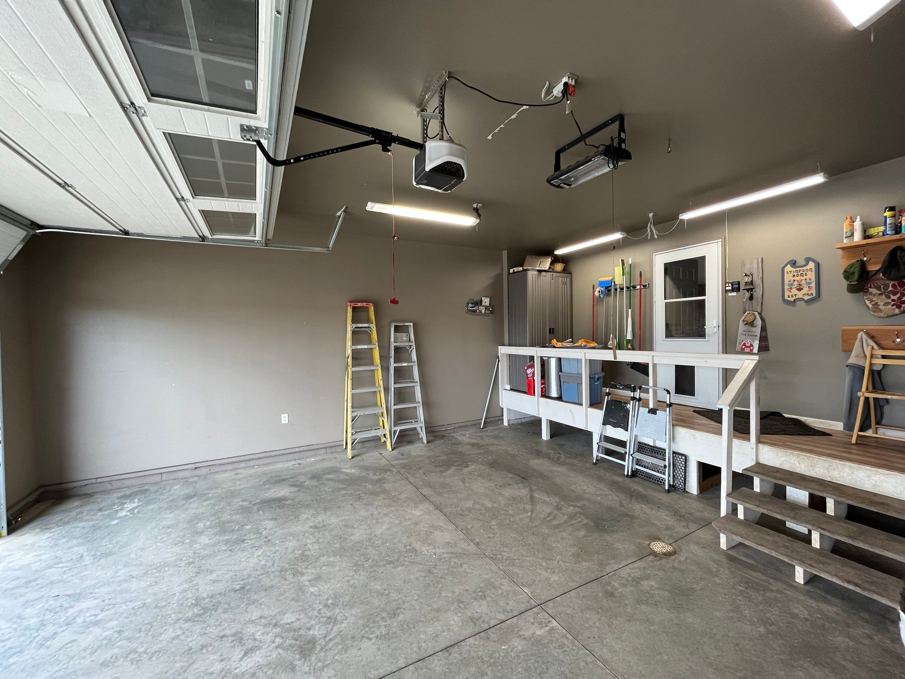 Garage using Domino  by Select Painting, Coatings & Garage Cabinets