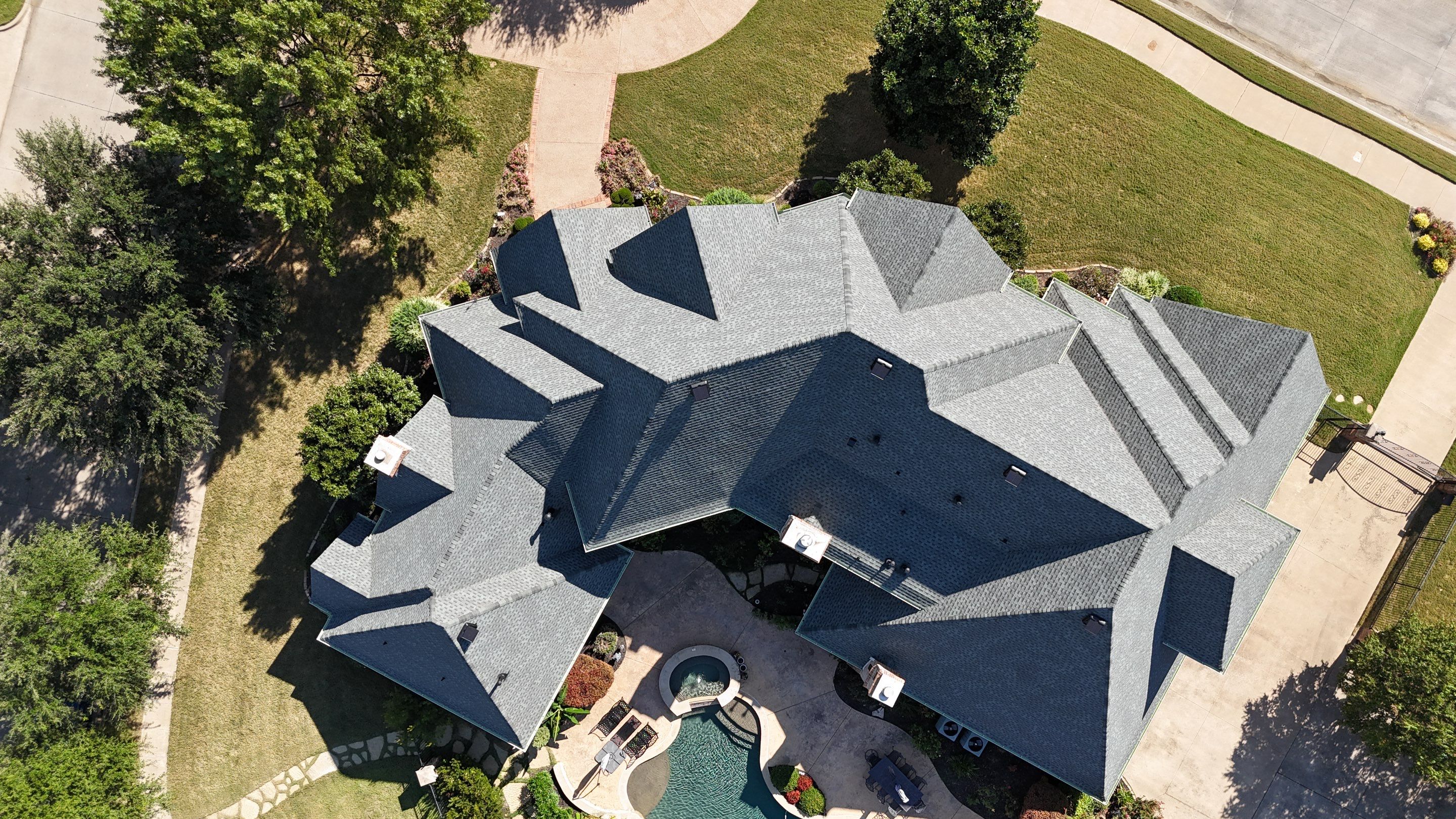 Southlake Texas Estate - Roof, Copper Awning and Gutter Project by First United Roofing & Construction