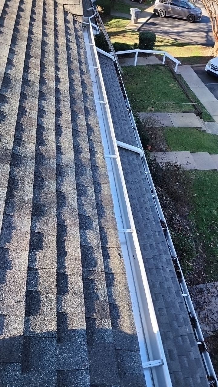Gutter Cleaning using water by Power Wash Masters LLC