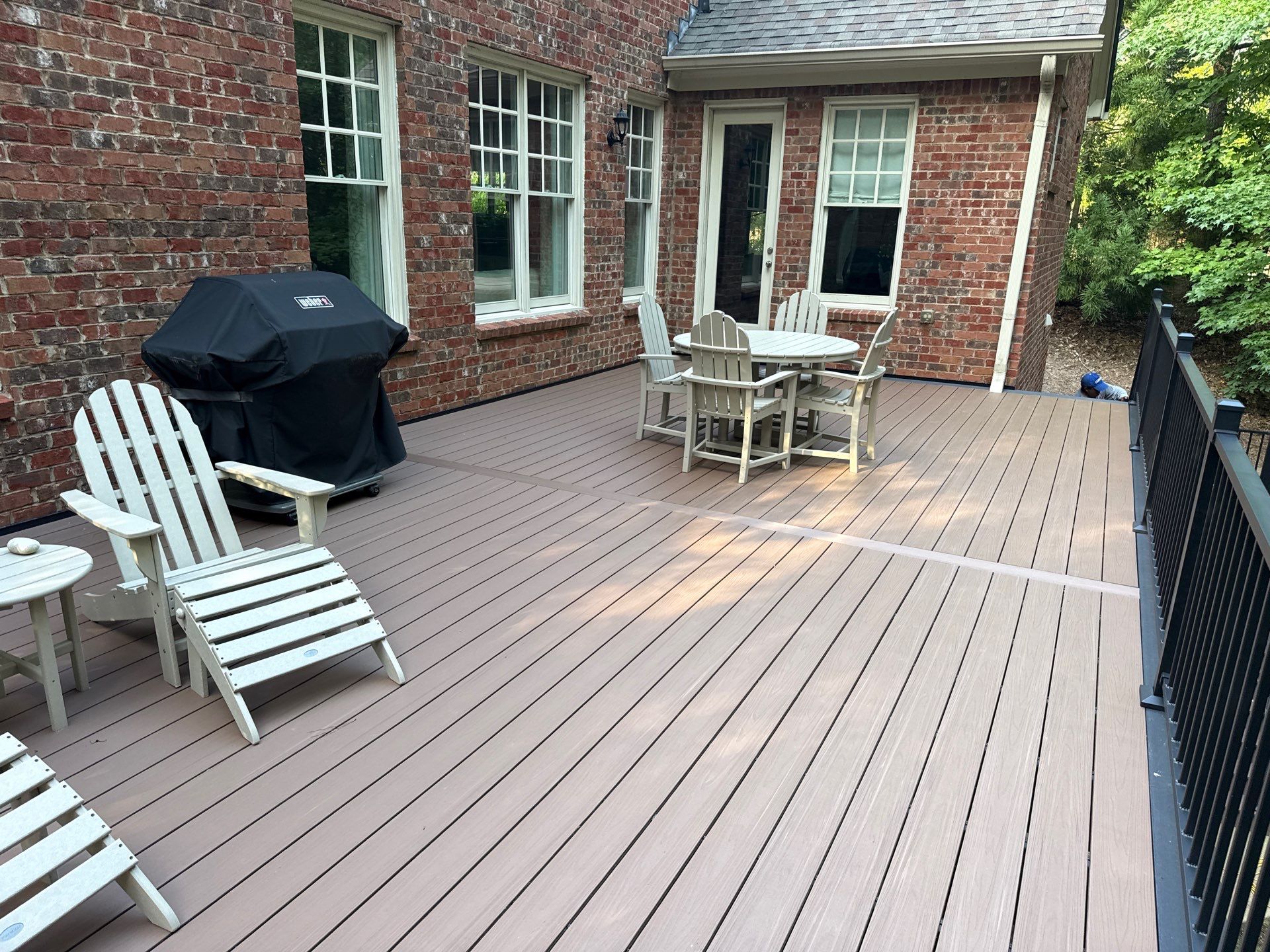 Deck Resurface using Deckorators Summit Series and Deckorators ALX Contemporary railing by Nelson Exteriors 
