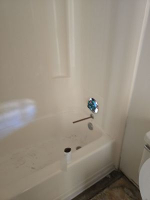 Installation of Bathtub, Fixtures, Washer & Dryer Water Lines, and New Piping