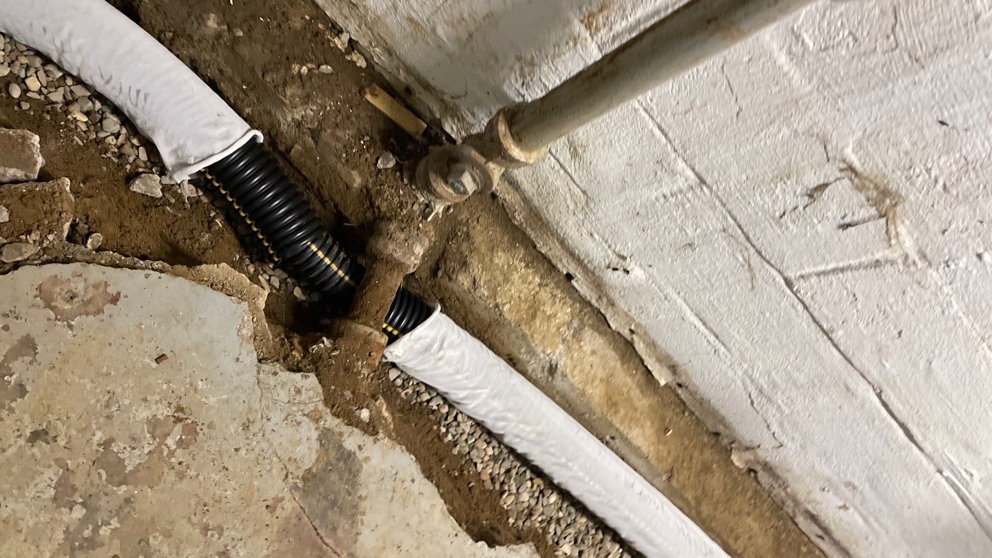 Interior Drain Tile & Yard French Drain in St. Paul, MN by Waterproofing Northeast