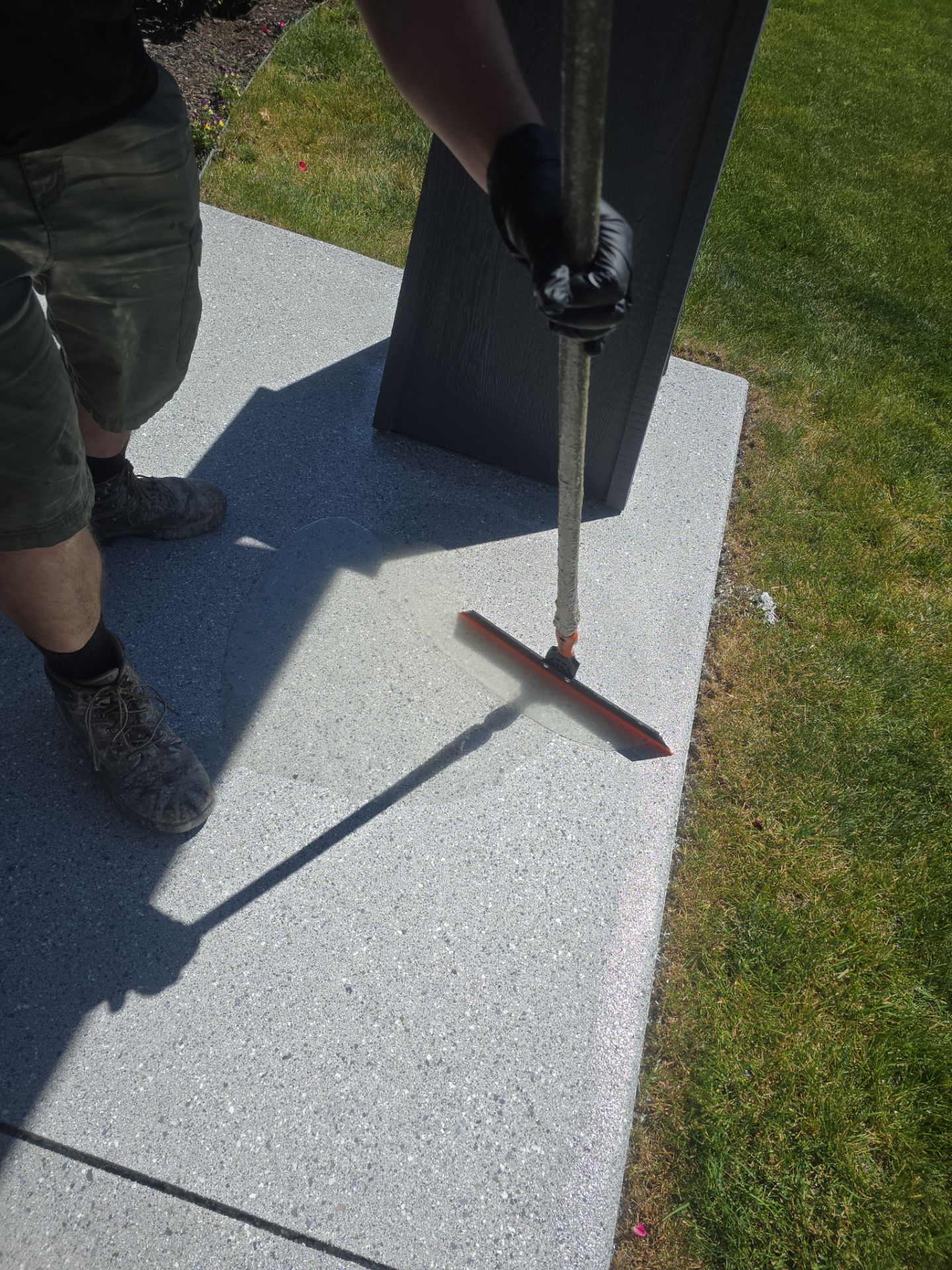 Sandpoint Patio Transformation With Agate And Battleship Hybrid Coatings by Croc Coatings, LLC