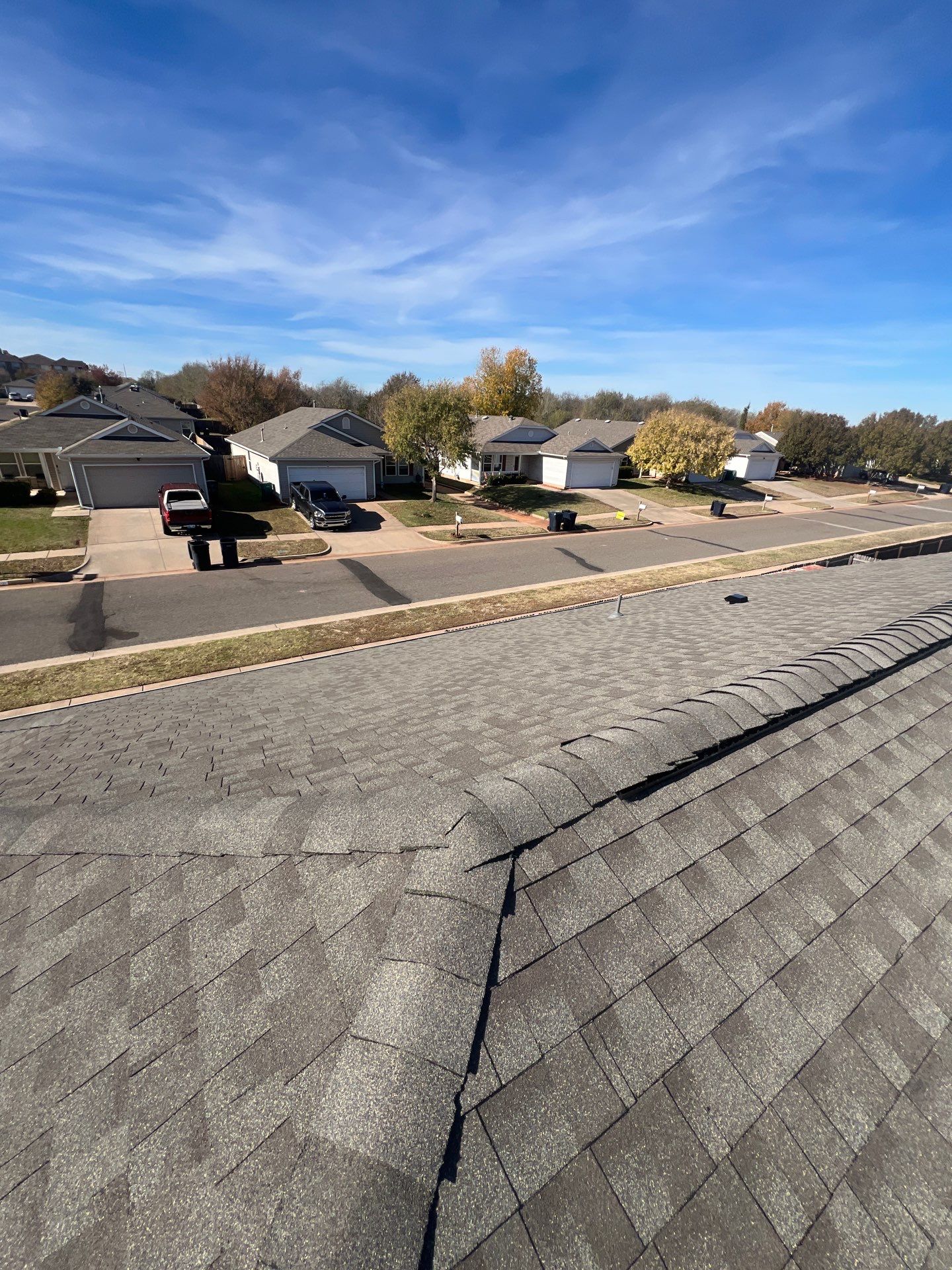 roof replacement & gutter installation in Edmond by McCann's Roofing and Construction