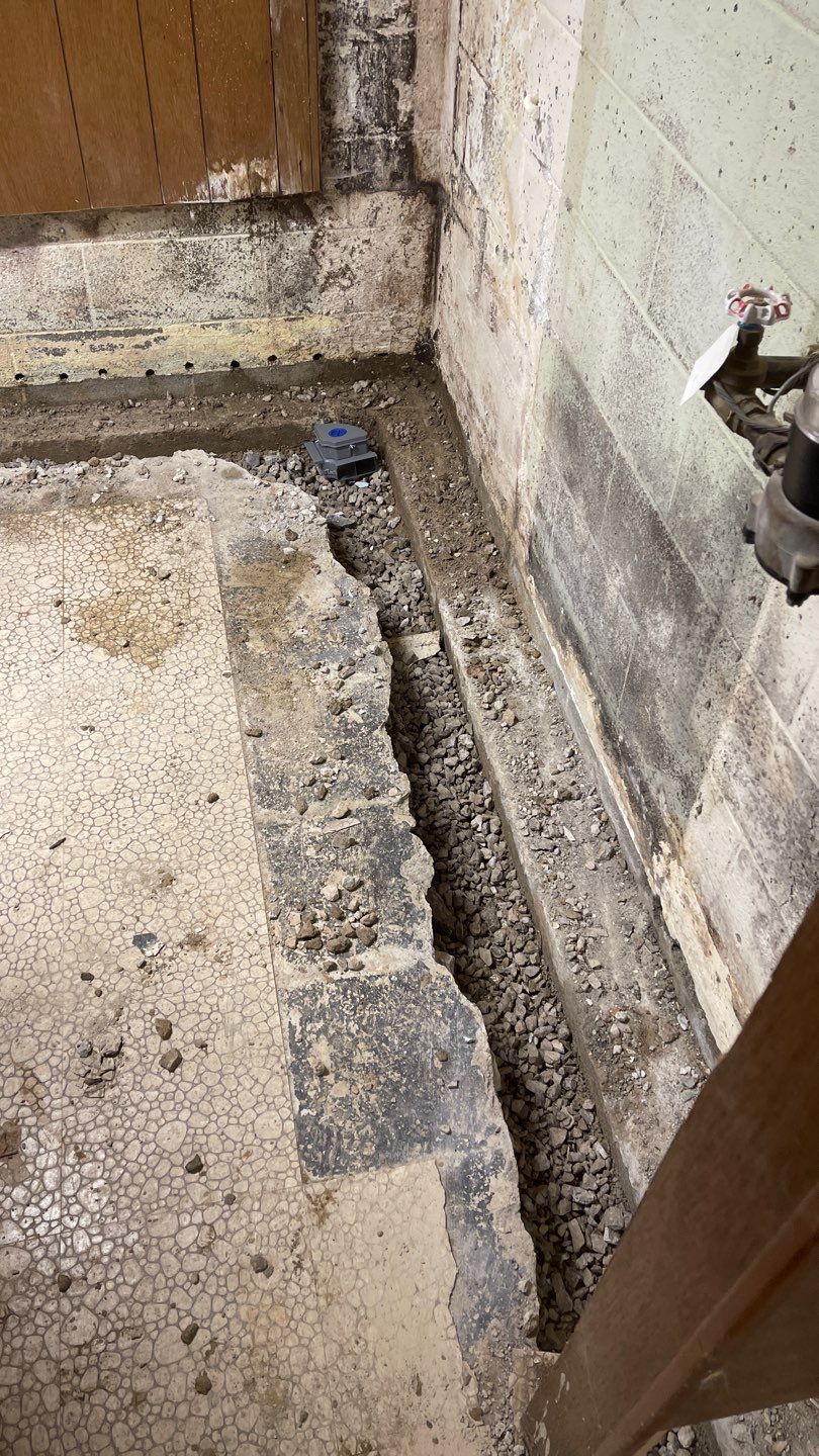 Interior Waterproofing Using GrateDrain™ Products by Toledo Basement Repair 