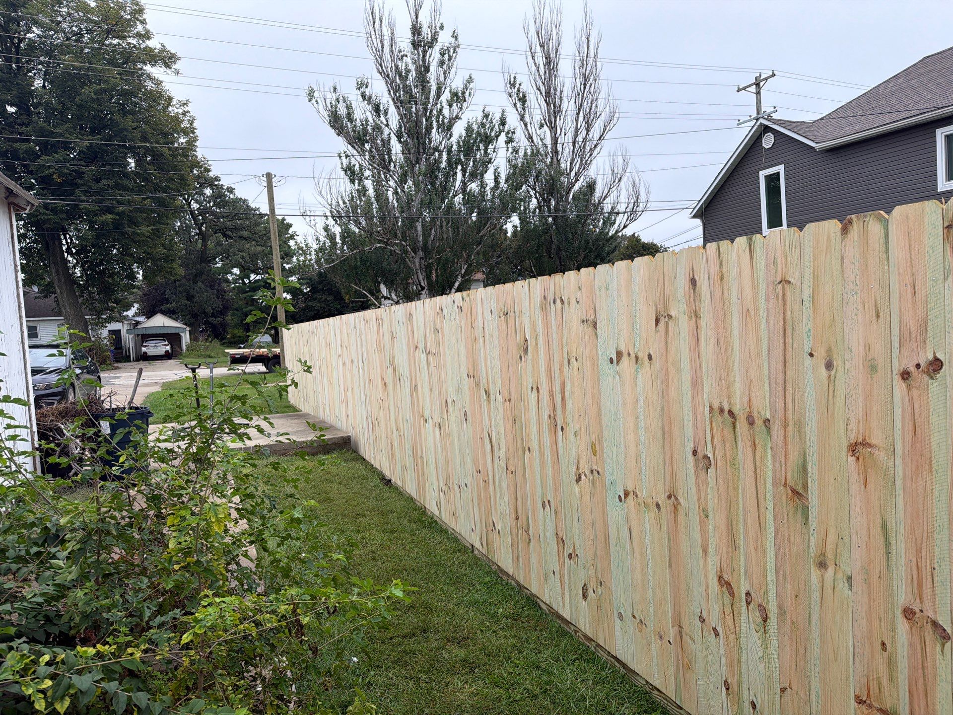 Custom Wood Privacy Fence and Black Chain Link Gate in Independence by Perfect Picket Fence and Stain