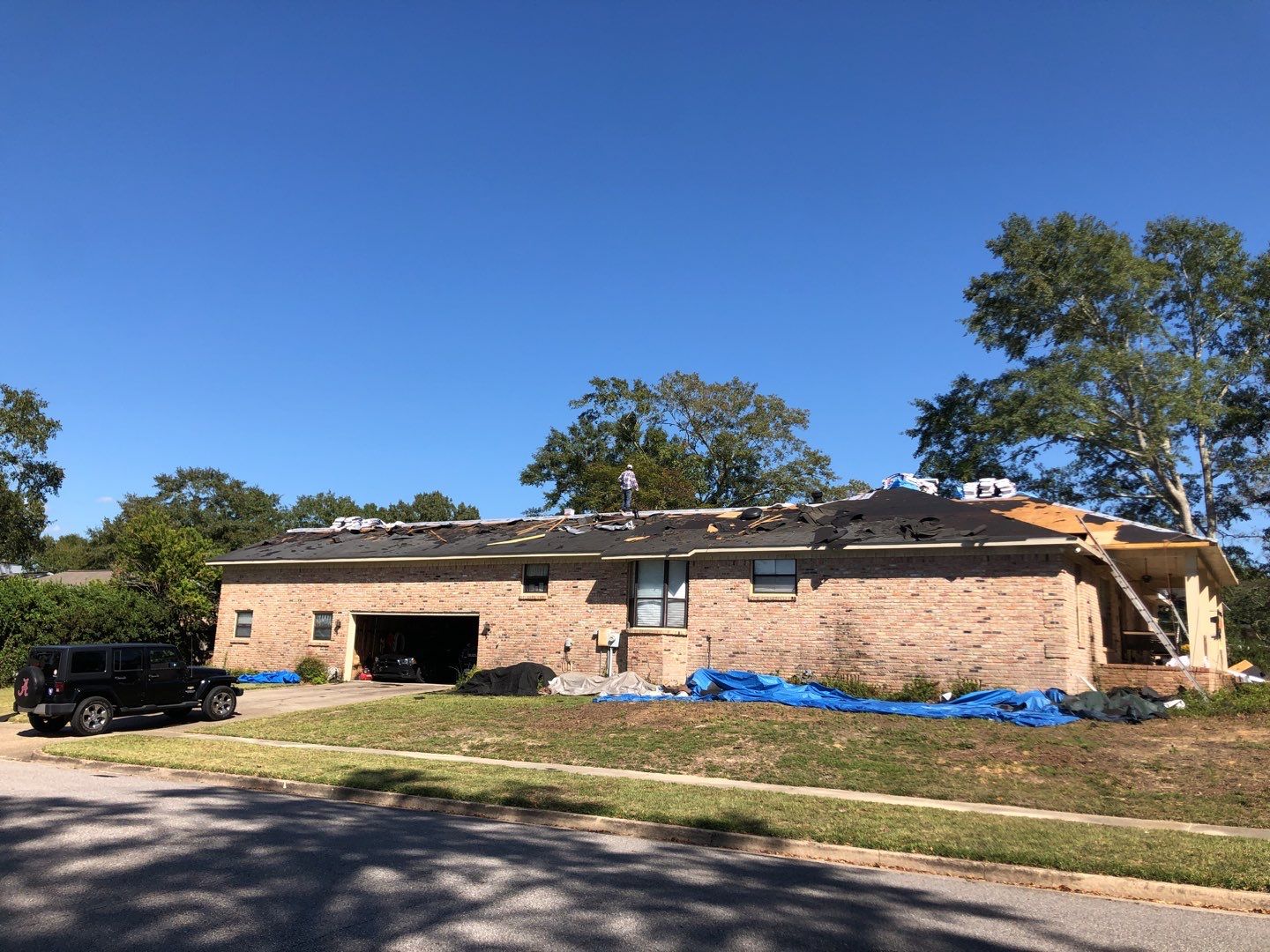 Residential Roofing Installation using Roof Replacement by American Roofing & Construction LLC