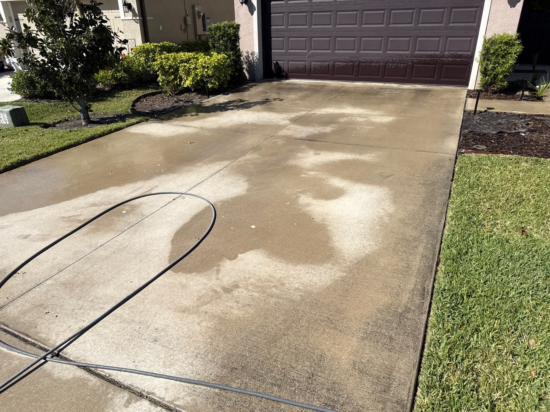 Painted Lanai Floor, Screen Enclosure, and Driveway Cleaning in Trevesta Community, Palmetto, FL by Sunshine AquaWash