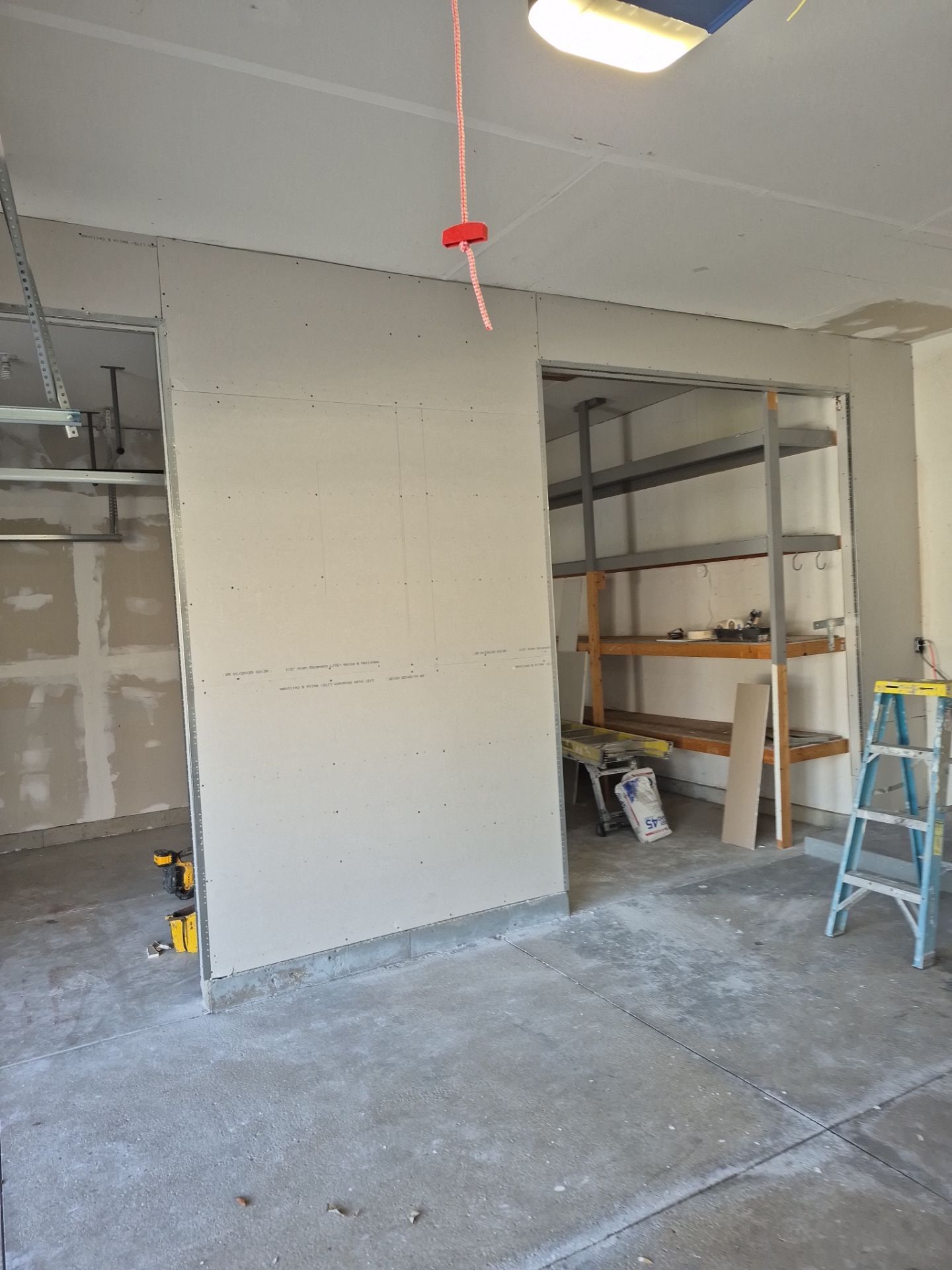 Custom Epoxy Flake Floor and Garage Wall Renovation in Ada by Gordon Painting