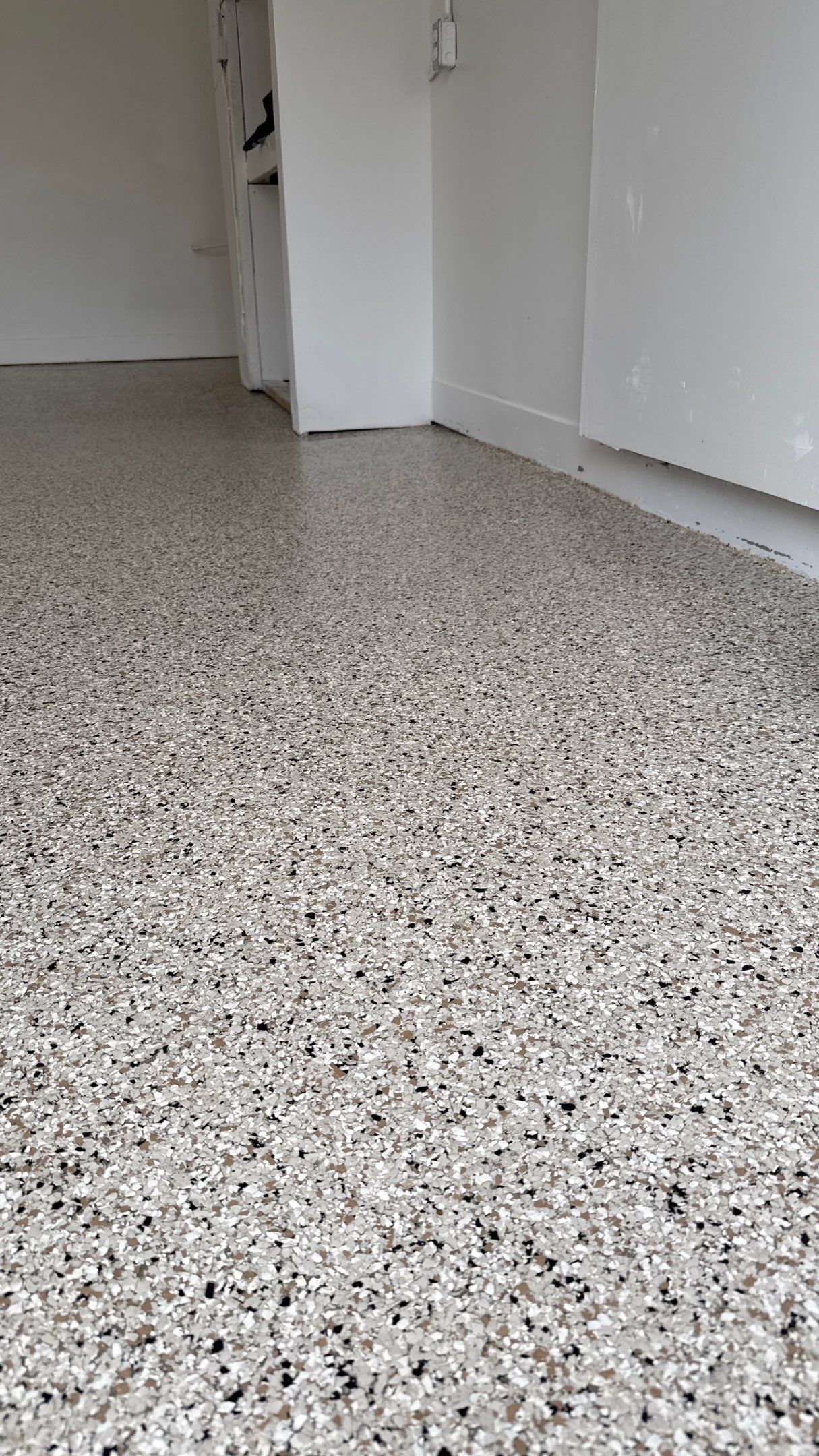 Check Out This Beautiful Shoreline Flake Floor  by Banner Garage