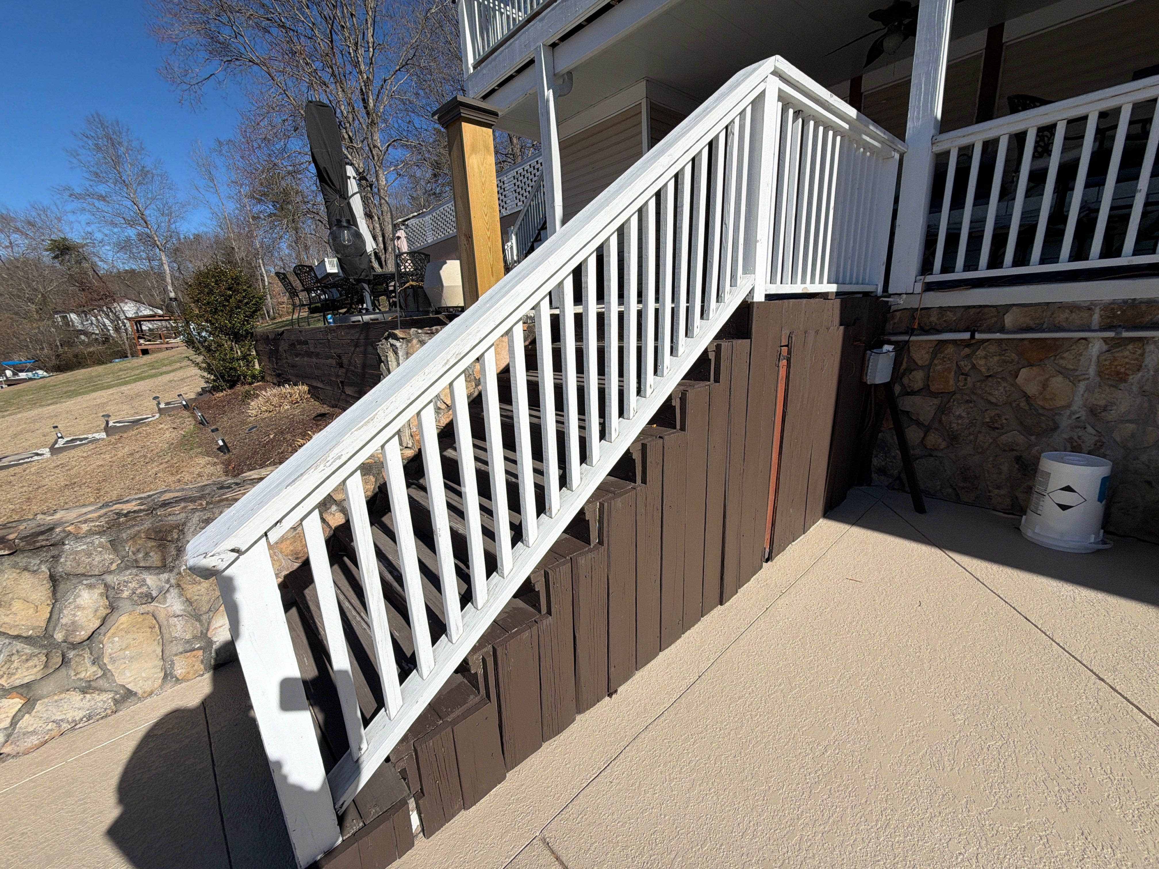 Cumming, GA Lake House Deck Resurface and Extension using Pressure Treated Pine and Skyline Cable Railing by Nelson Exteriors 