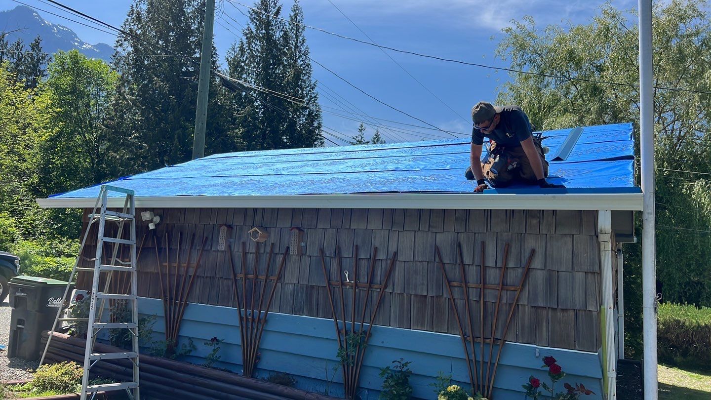 Residential ReRoofing Installation using Duraclad 26ga by Top Notch Roofing Inc