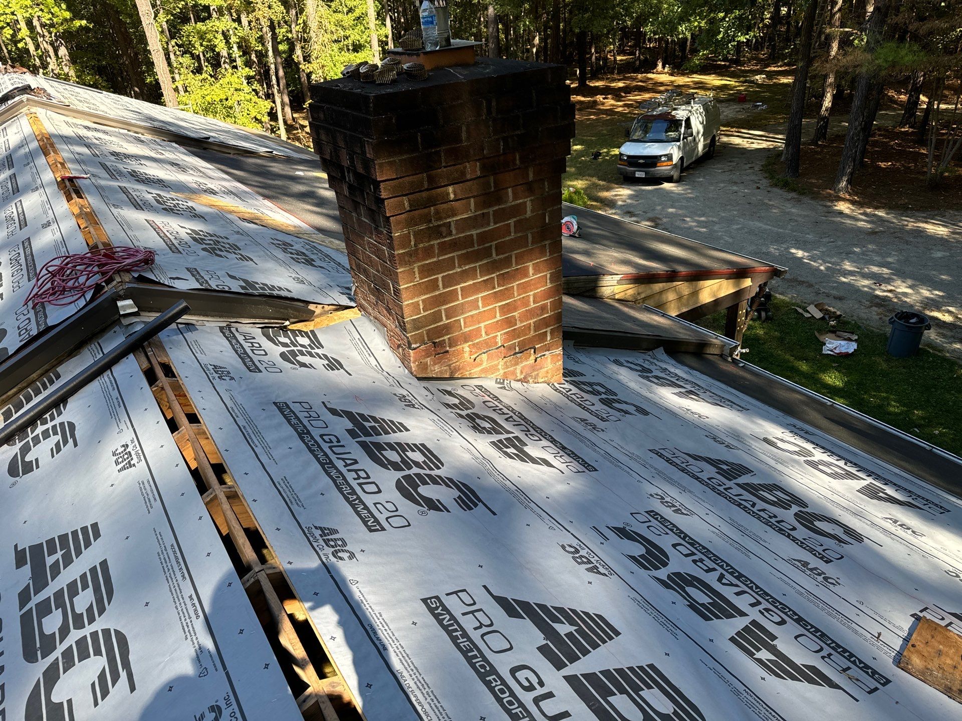 Architectural Shingle Roof Replacement and Chimney Flashing in Amelia Court House by Cade Construction