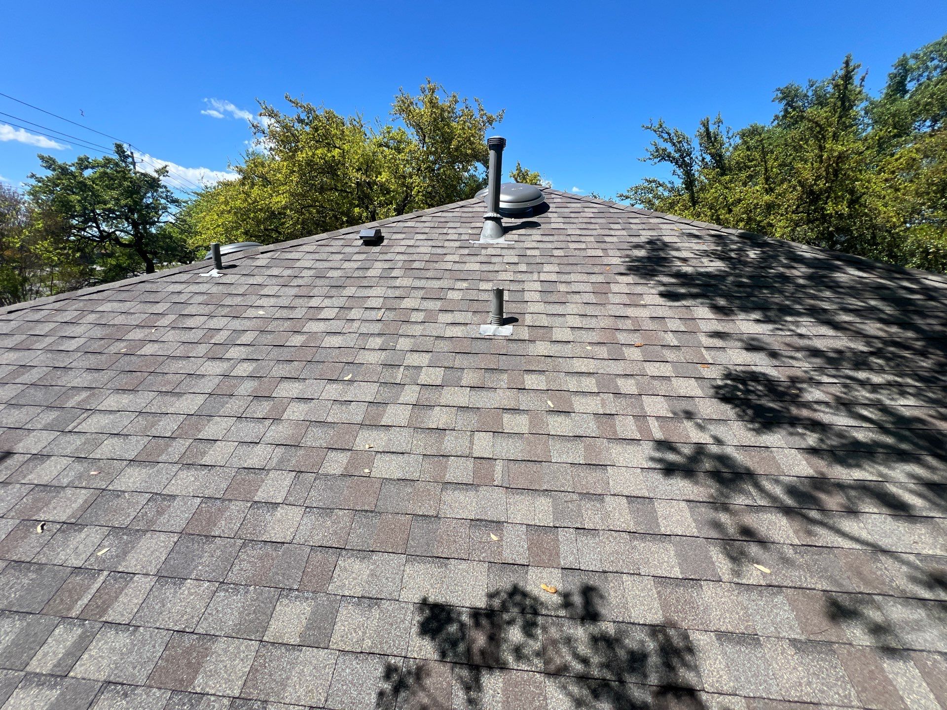 Rental property upgrade using CertainTeed Landmark shingles. by Oakwood Roofing and Construction, LLC