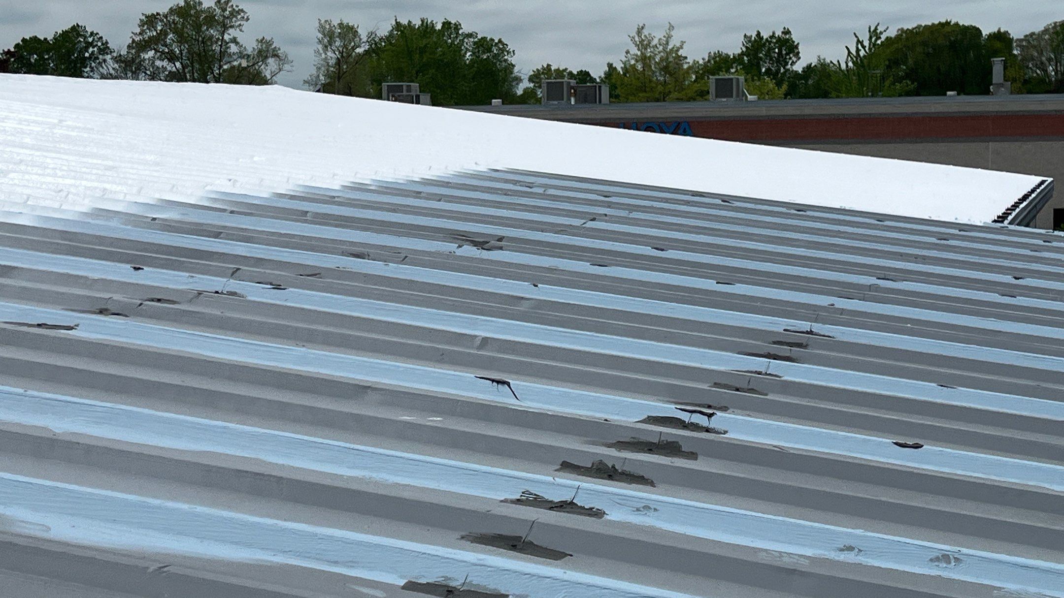 Berea Ohio Metal Roof Coating by Gold Star Roofing LLC 