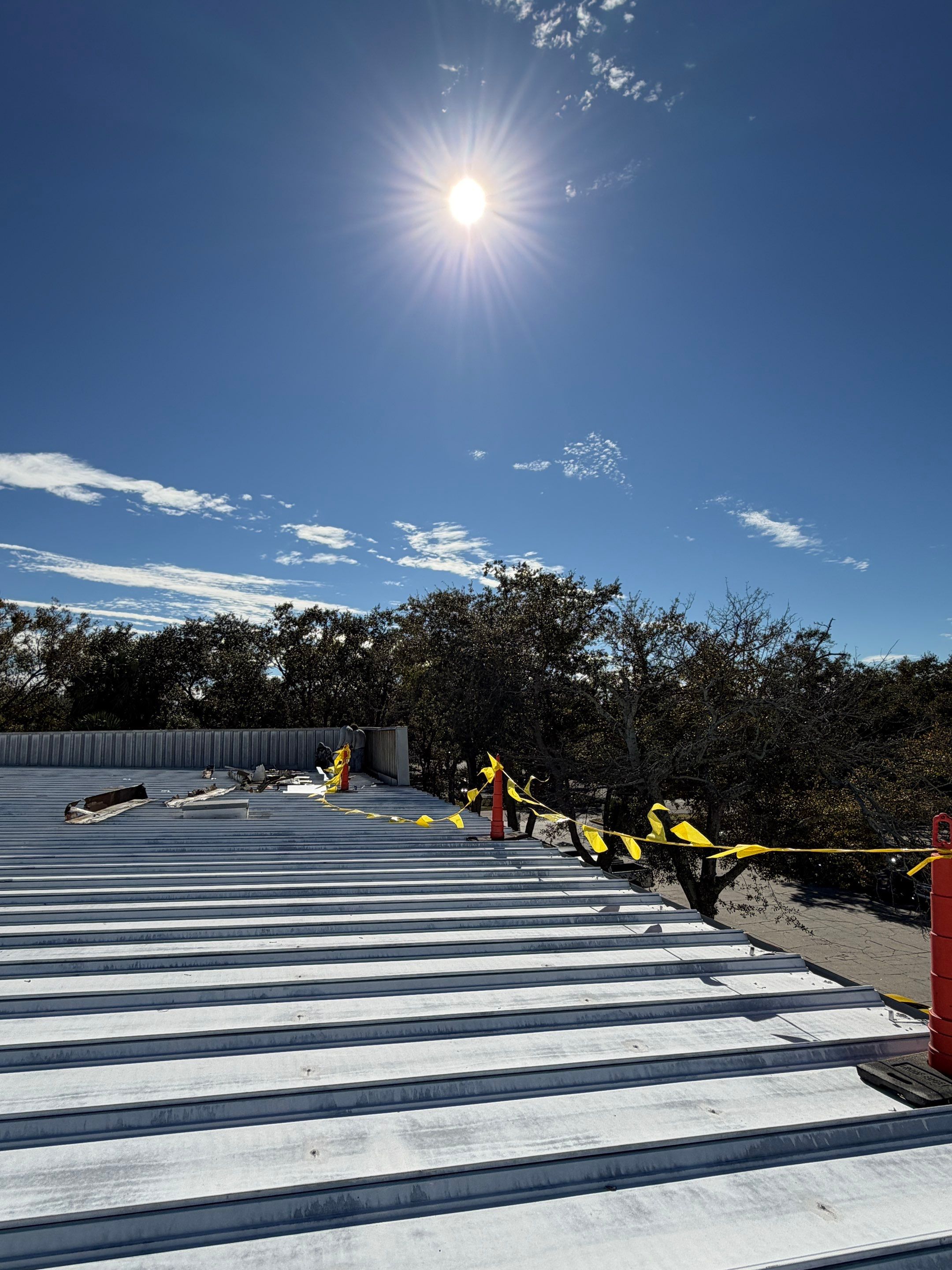 Sarasota Industrial Warehouse Metal Roof Silicone Coating Restoration by CES Roofing