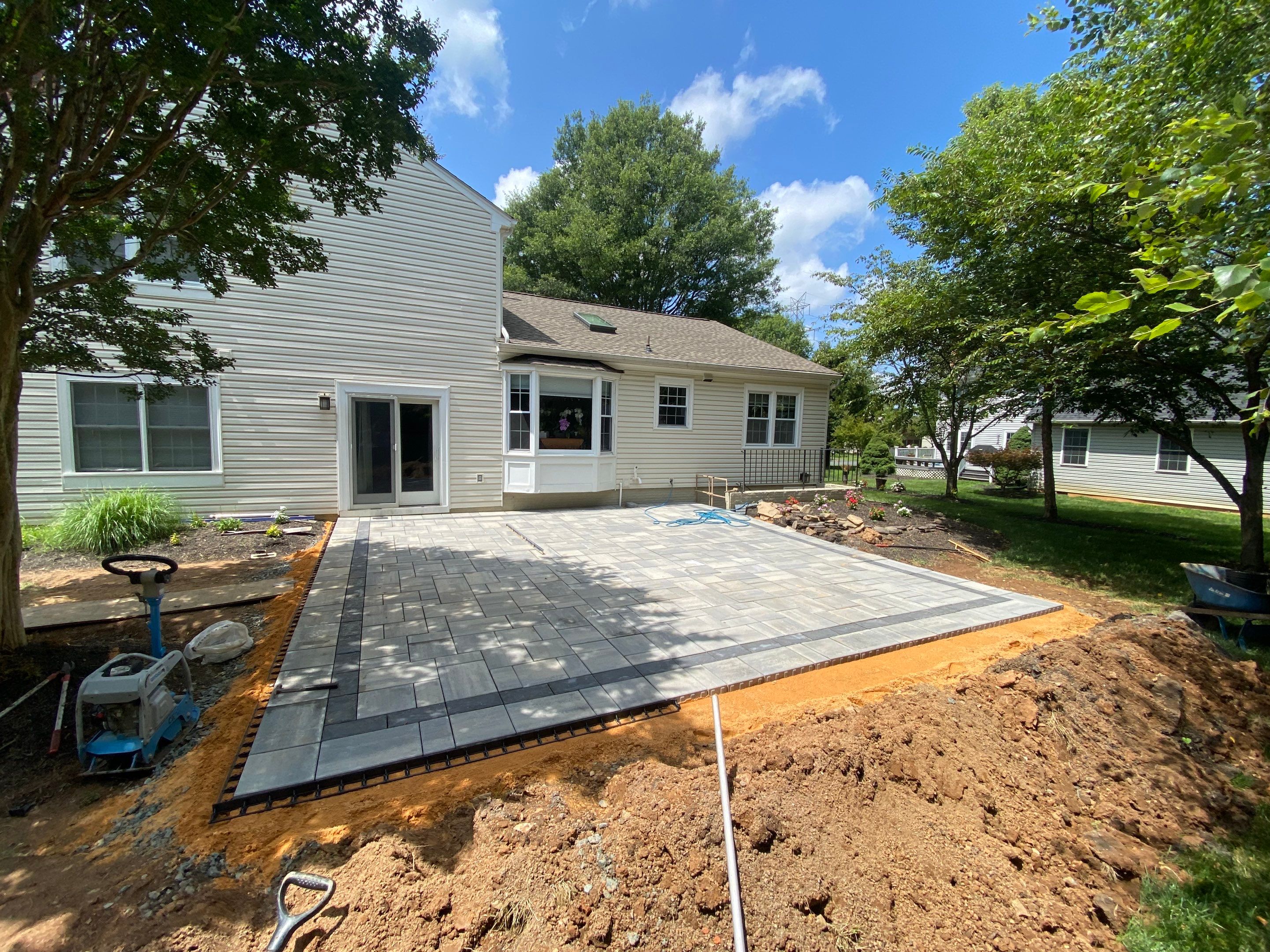 Backyard Transformation using Techo-Bloc Pavers by The Smet Companies, LLC