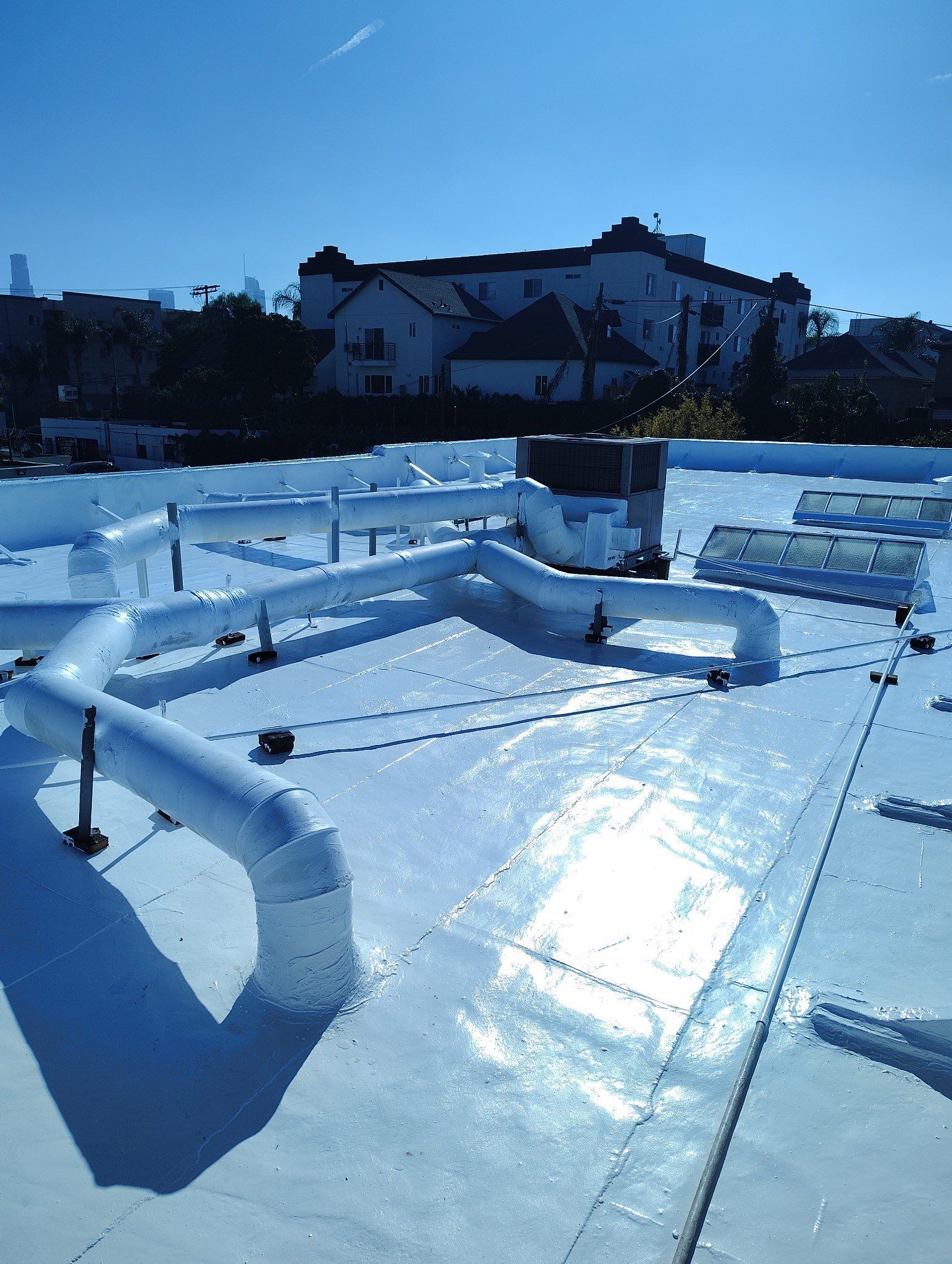 Commercial Roofing Installation using ASC Silicone Membrane by Hull Brothers Roofing