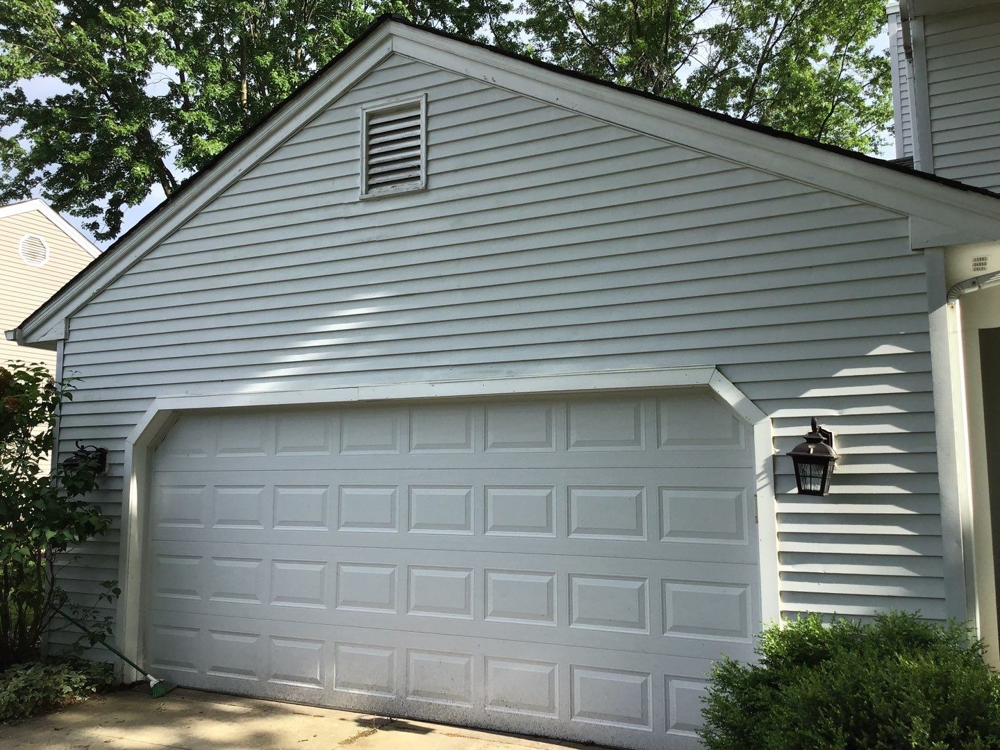 James Hardie Siding  using James Hardie Board and Batten, White by Absolute Roofing and Construction