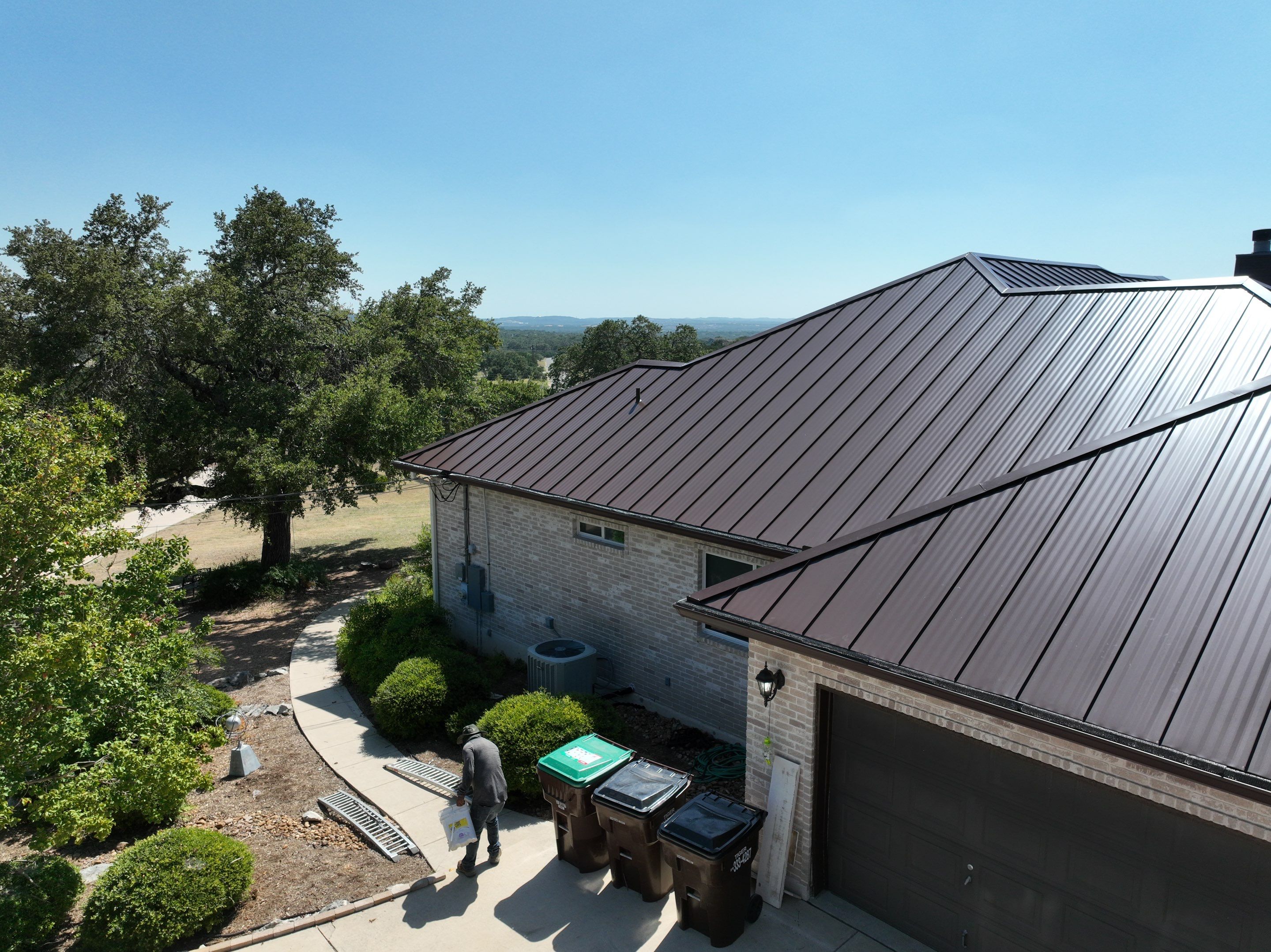 Residential Metal Roof Installation using McElroy Metal by Premier Roofing and Contracting