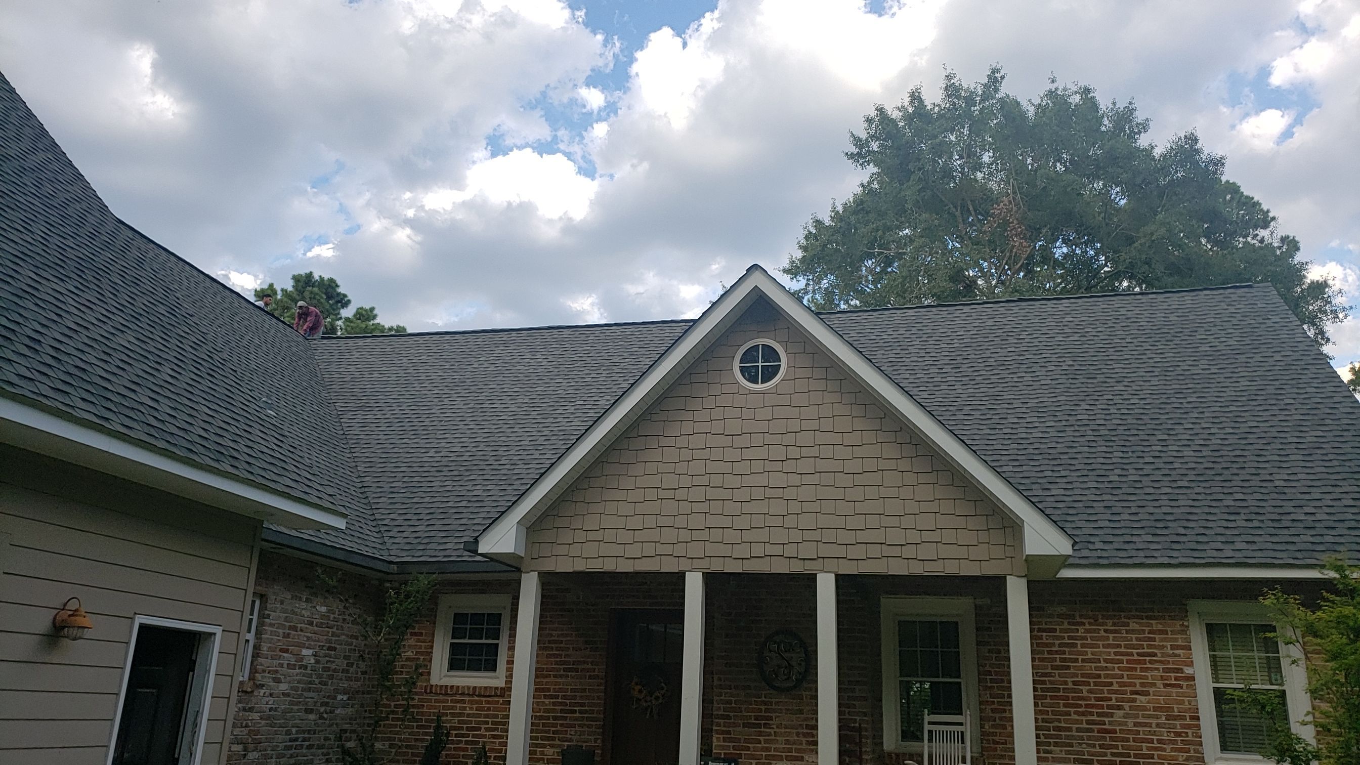 Residential Roofing Installation using Roof Replacement by American Roofing & Construction LLC