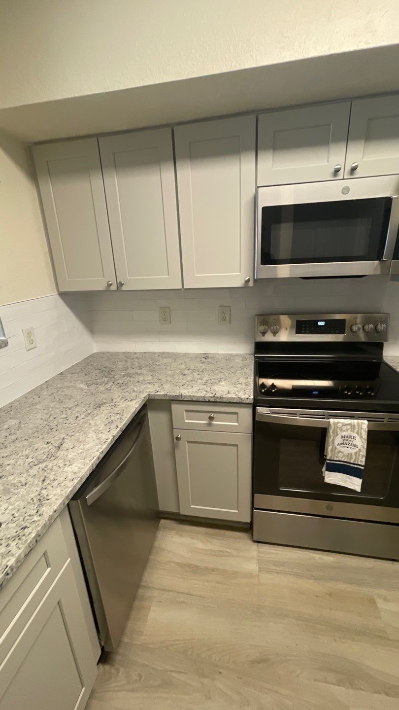 Home Remodel using LVP Flooring and Cabinets by HandyMangum