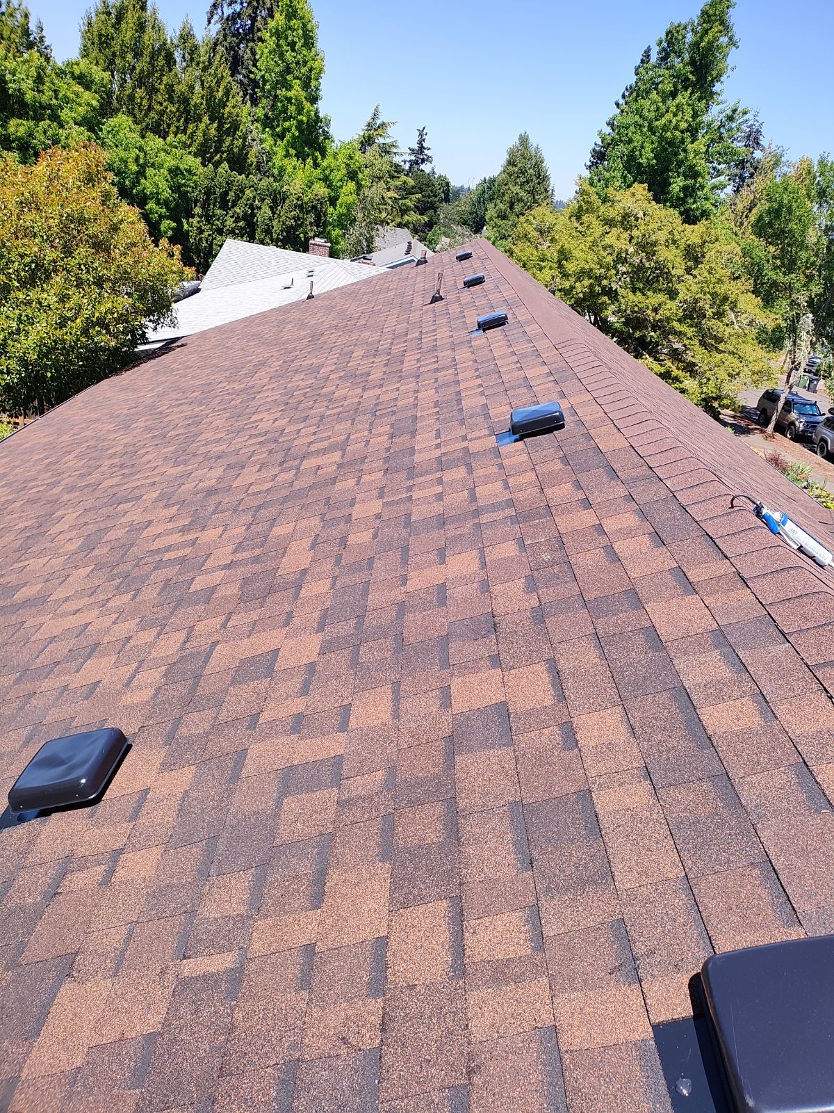 Residential Reroof using Owens Corning Duration Shingles in the color Brownwood. by BEST Roofing & Waterproofing