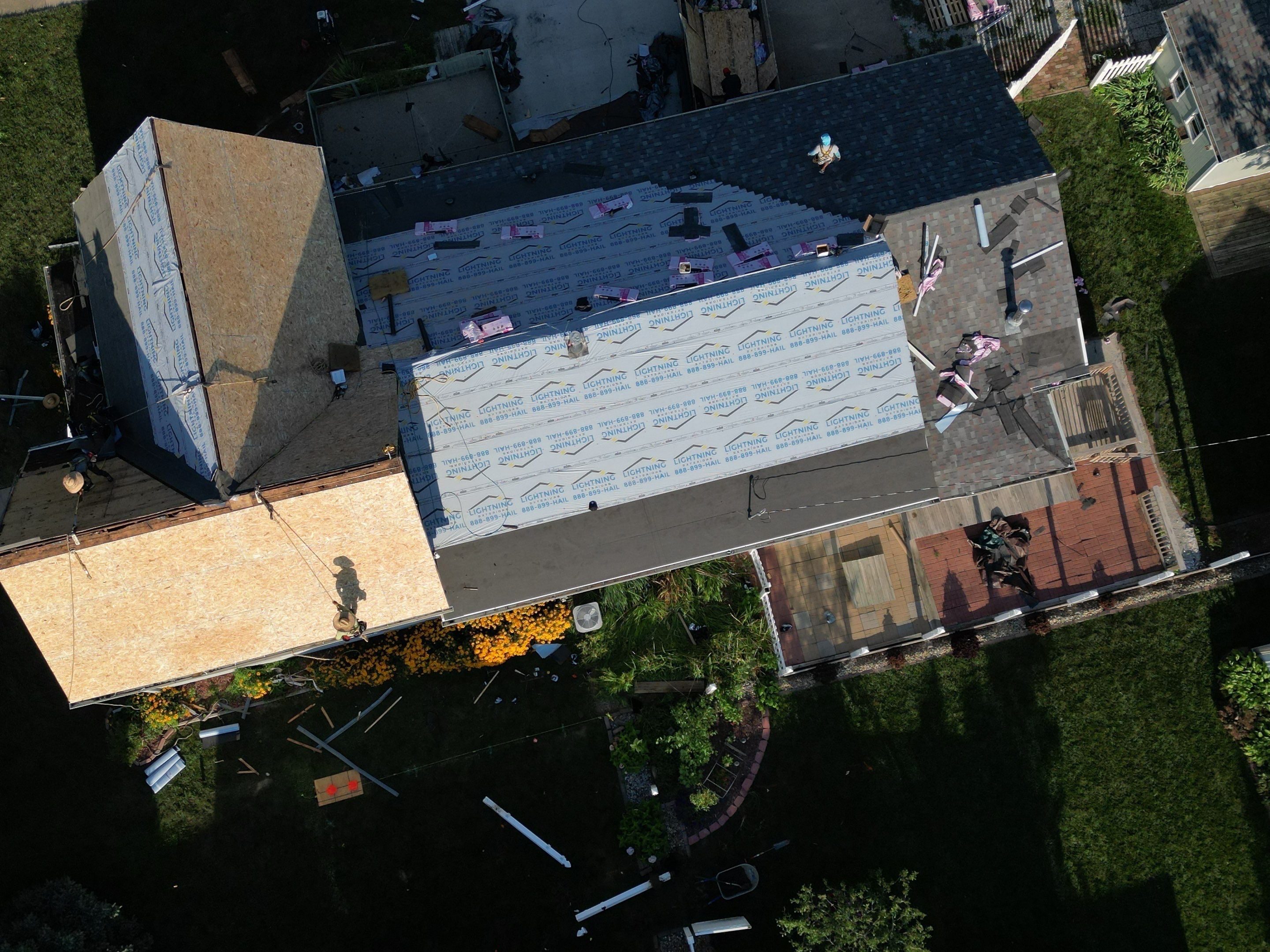 Residential Roofing Installation using Owens Corning Duration Colonial Slate by Lightning Exteriors