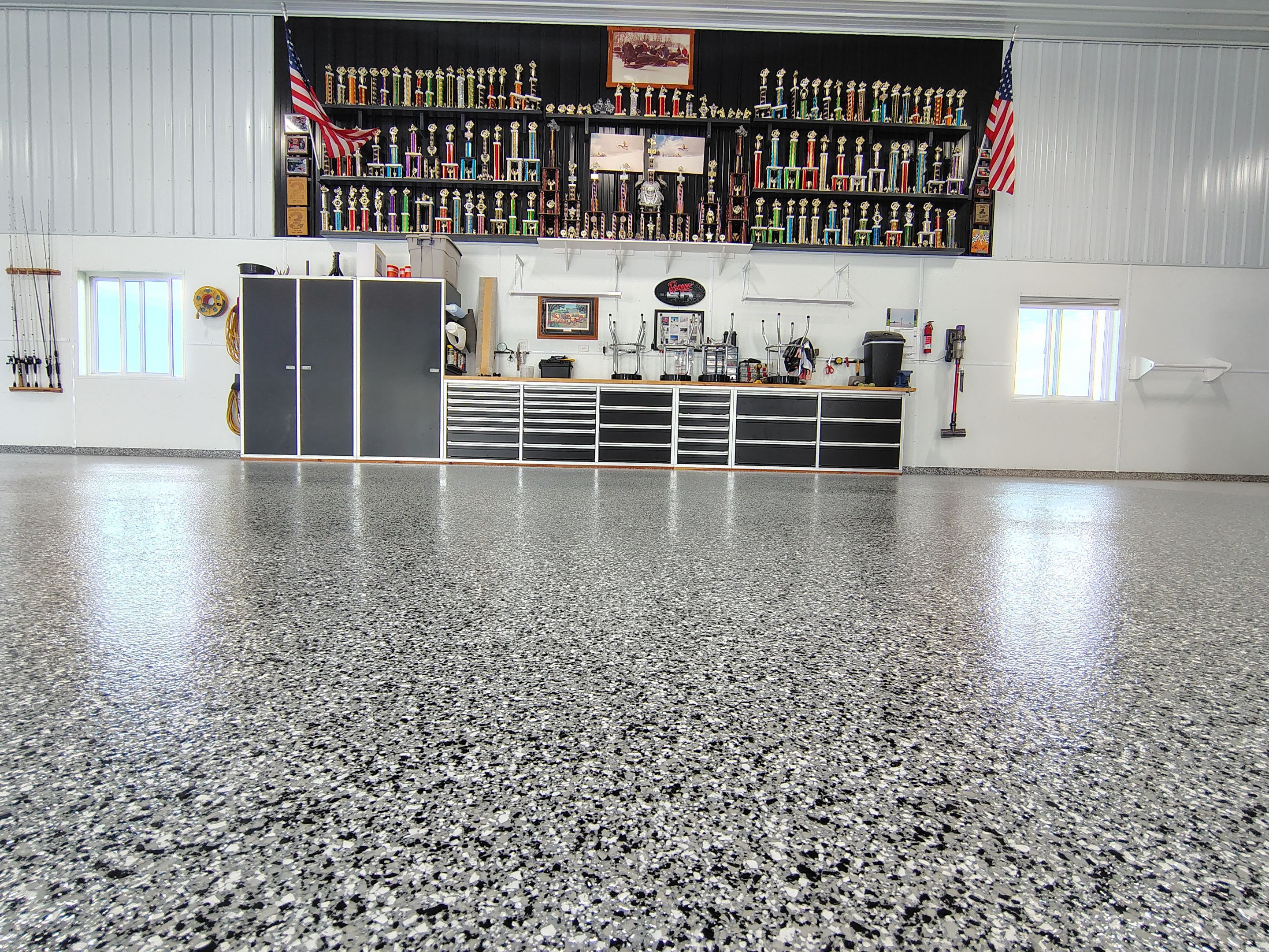 Multi-Stage Concrete Floor Coating for Egan Shop and RV Storage by Select Painting, Coatings & Garage Cabinets