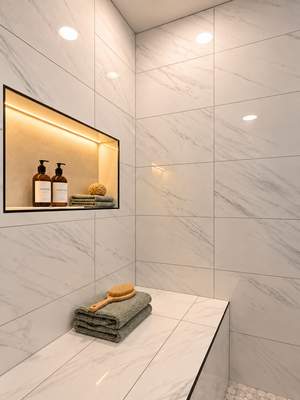 Luxury Walk-In Shower Remodel with Marble Tile & Matte Black Fixtures by Remodel Now