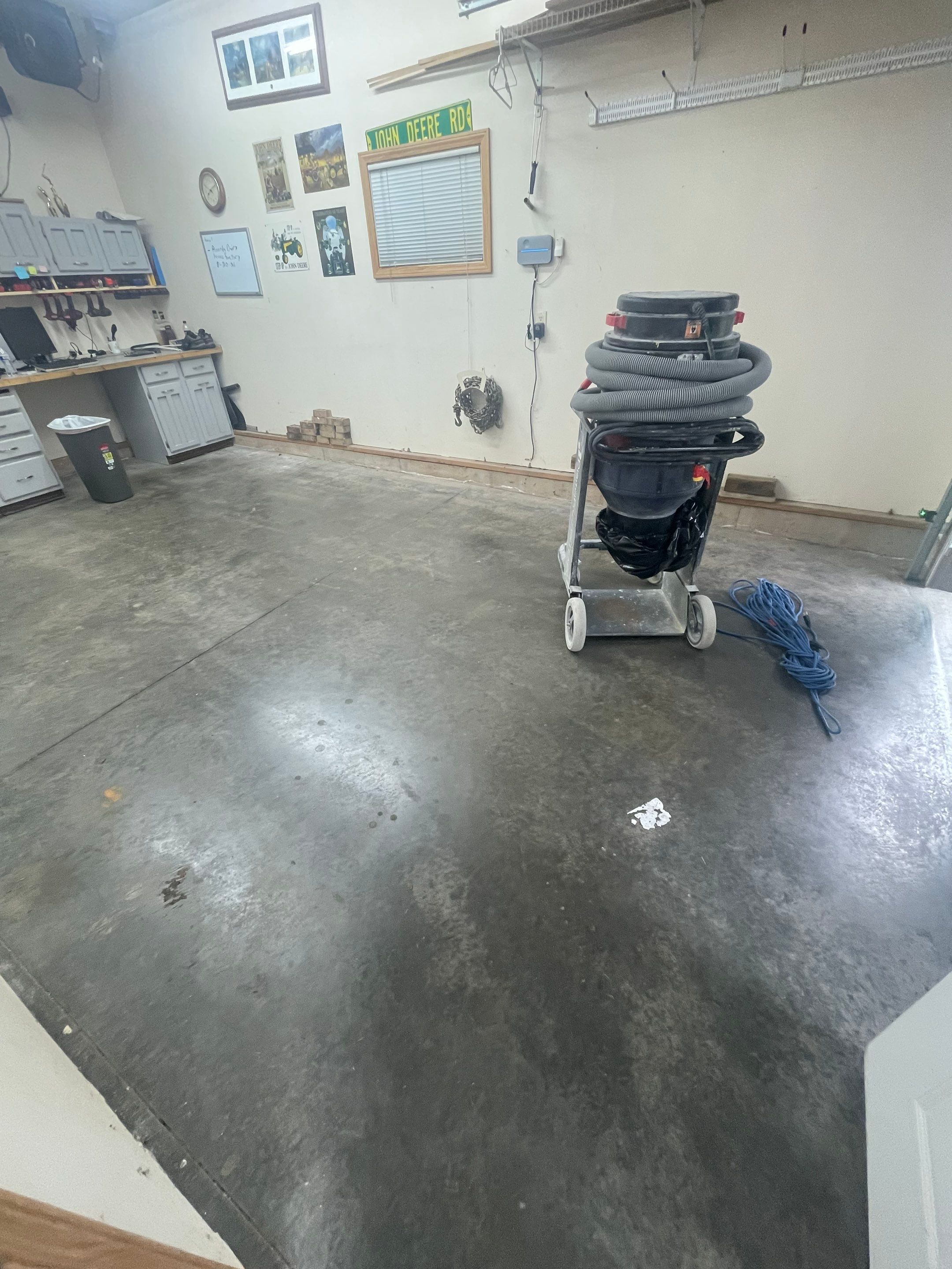 Multi-Stall Garage Floor Coating Installation in Sioux Falls by Select Painting, Coatings & Garage Cabinets
