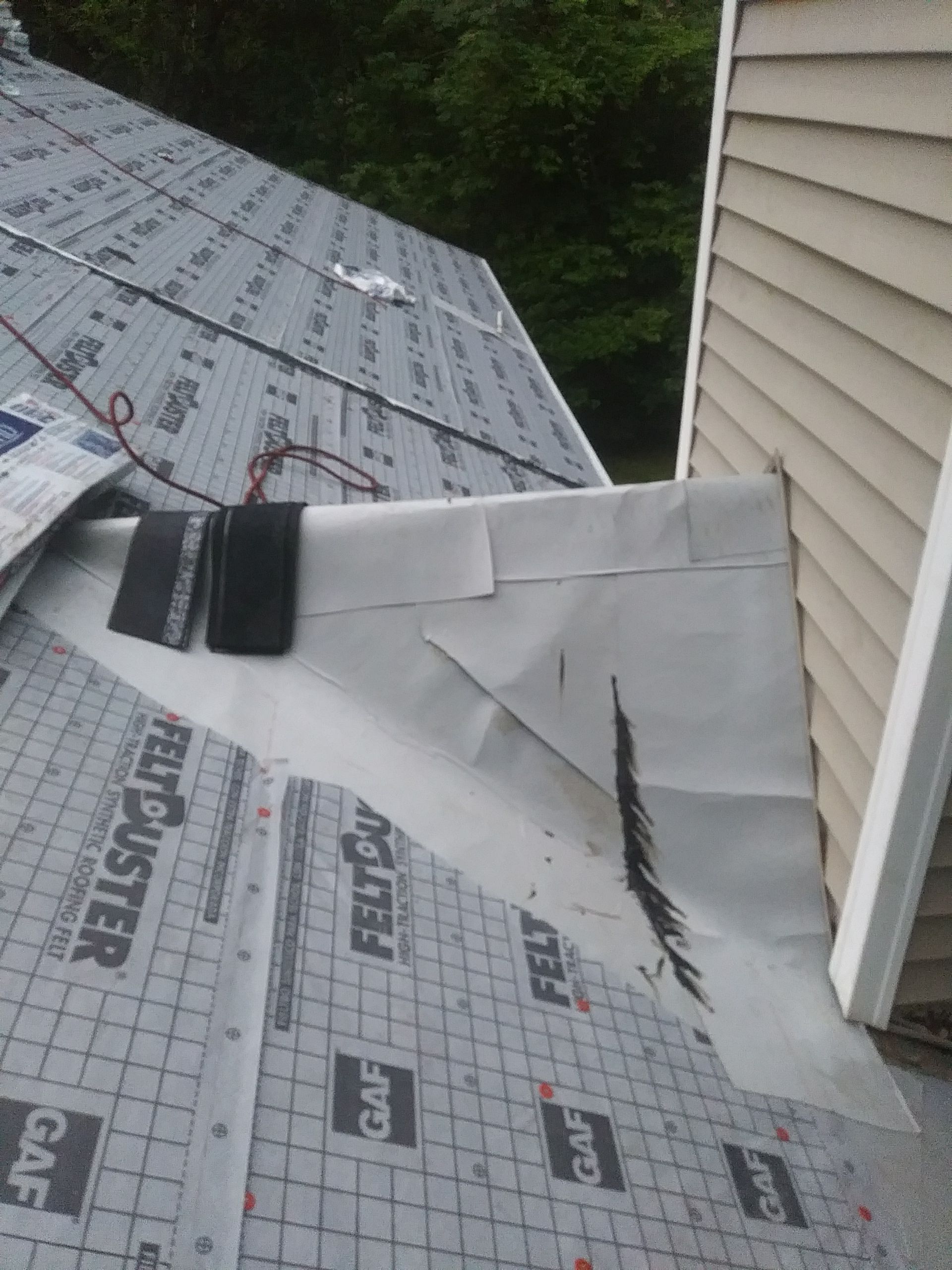 Residential Roofing Installation using Roof Replacement by American Roofing & Construction LLC