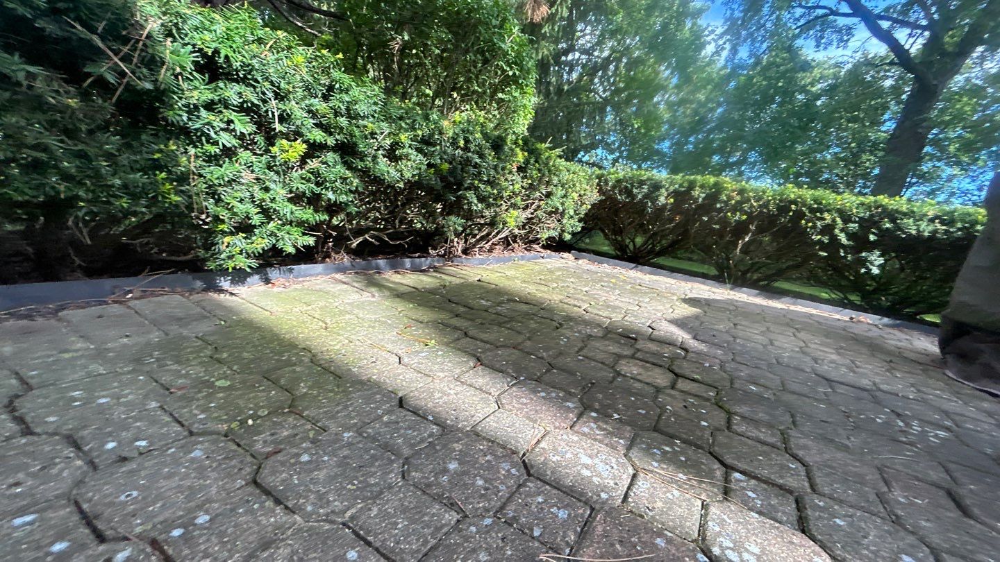 Brick paver repair, clean and seal by Northern Power Washing LLC.