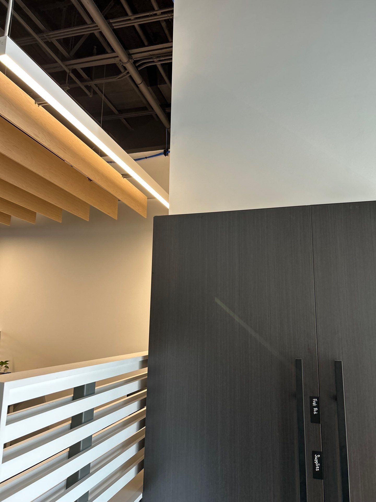 Office Remodel Featuring Acoustic Baffles and Professional Carpet Installation by CompanyCam Sales Demo
