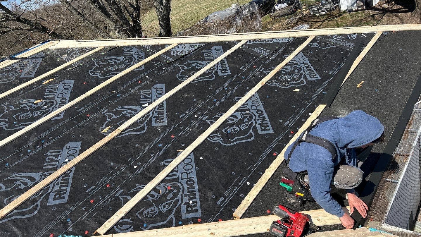 Commercial Roofing Installation using Performance Panel Metal - Frost Black by RoofX 