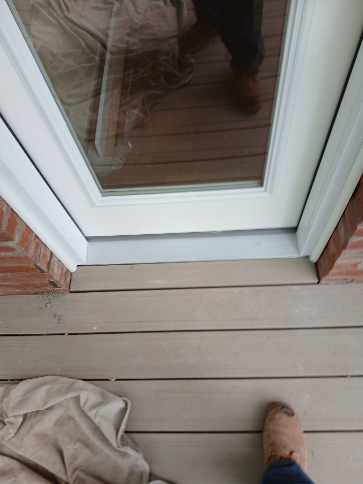 Deck and door install by Cousins Roofing Siding & Decks