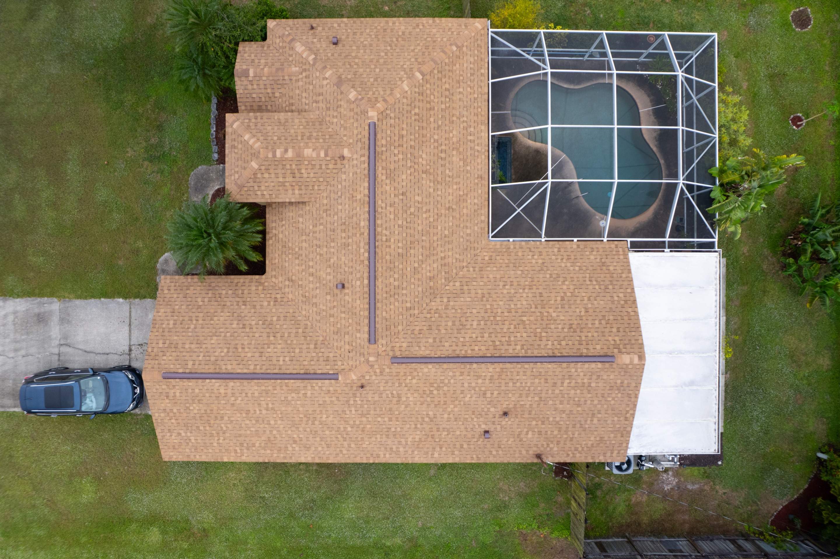 Full Asphalt Shingle Roof Replacement and Decking Repair in Palm Bay by Wiedmann Construction & Roofing