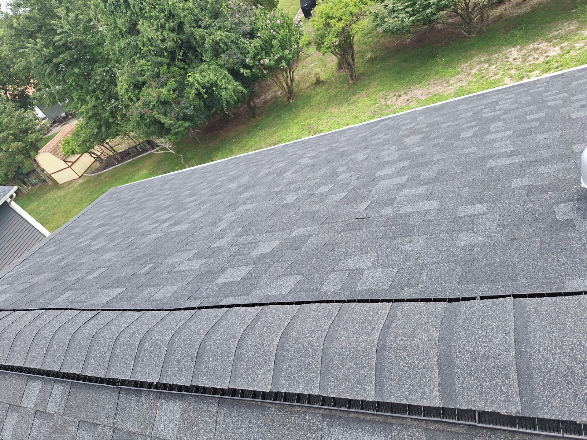 Estate Gray Shingles by Reimagine Roofing