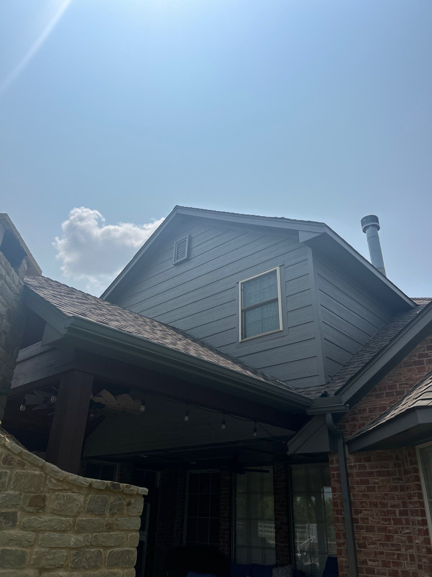 Siding Replacement and Exterior Painting and Pergola Cover Install in Edmond, OK by McCann's Roofing and Construction