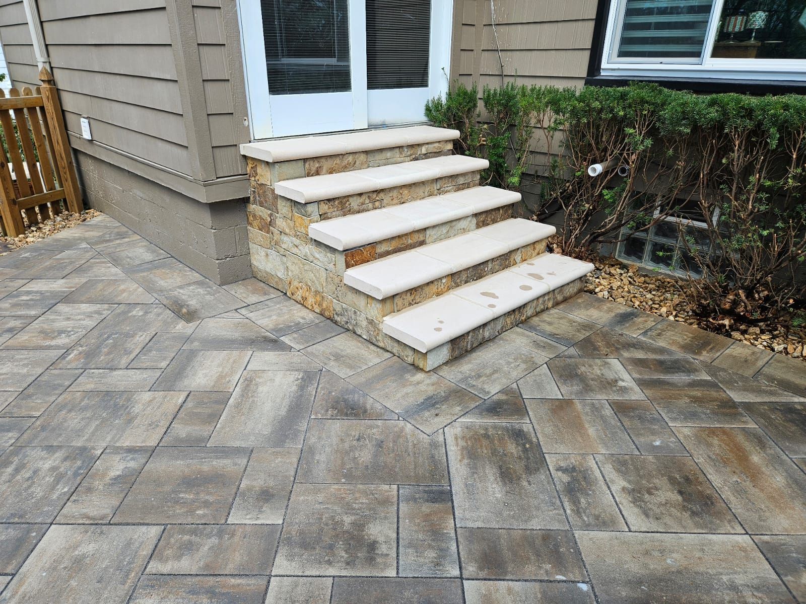 Gas Firepit Paver Patio by LAND ESCAPES LLC