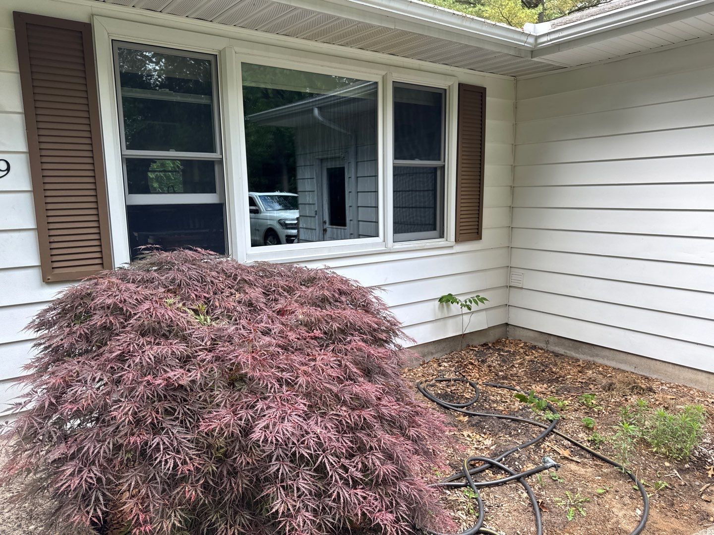 Exterior Remodel & Custom Deck by Cutting Edge Homes